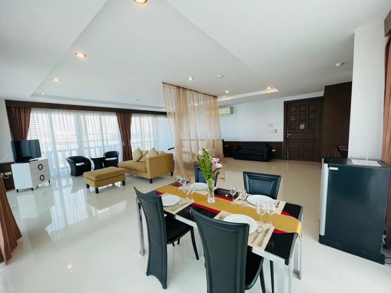 Communal lounge/ TV room in The Sand Beach Pattaya