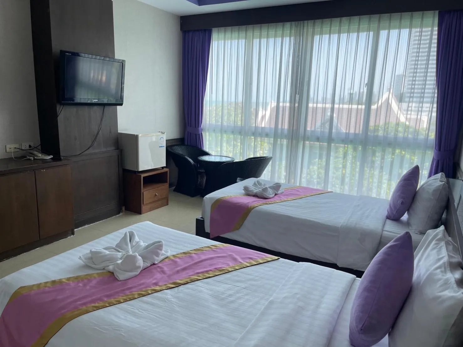 Communal lounge/ TV room, Bed in The Sand Beach Pattaya