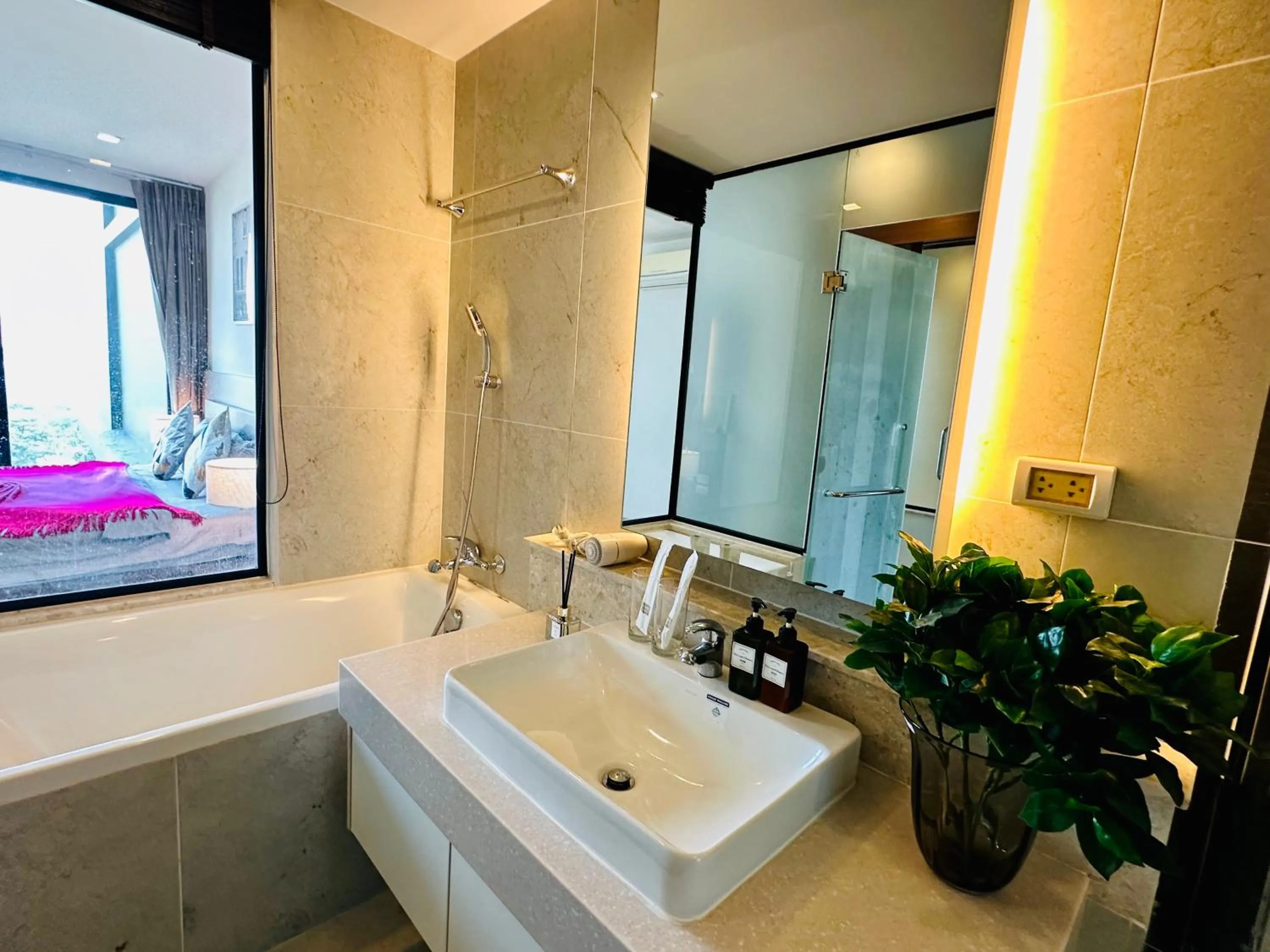 Bed in The Astra Condo Changkhlan in Chiang Mai