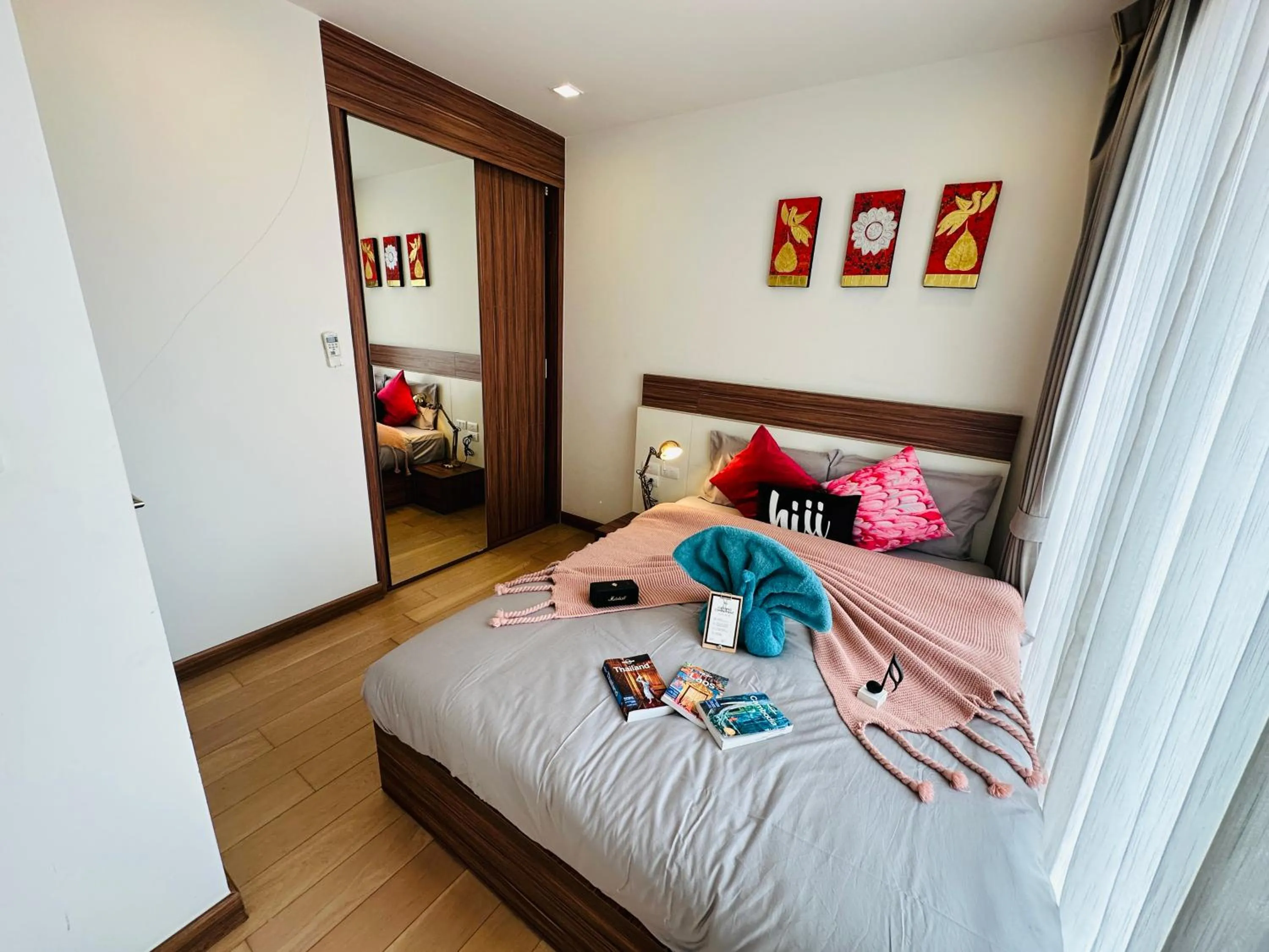 Bed in The Astra Condo Changkhlan in Chiang Mai