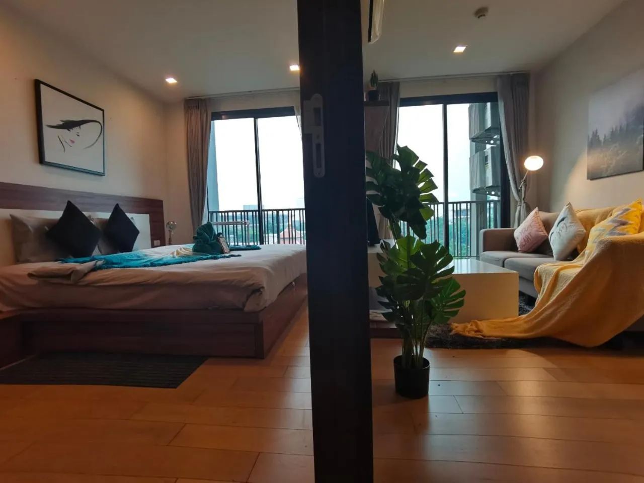 Bed in The Astra Condo Changkhlan in Chiang Mai