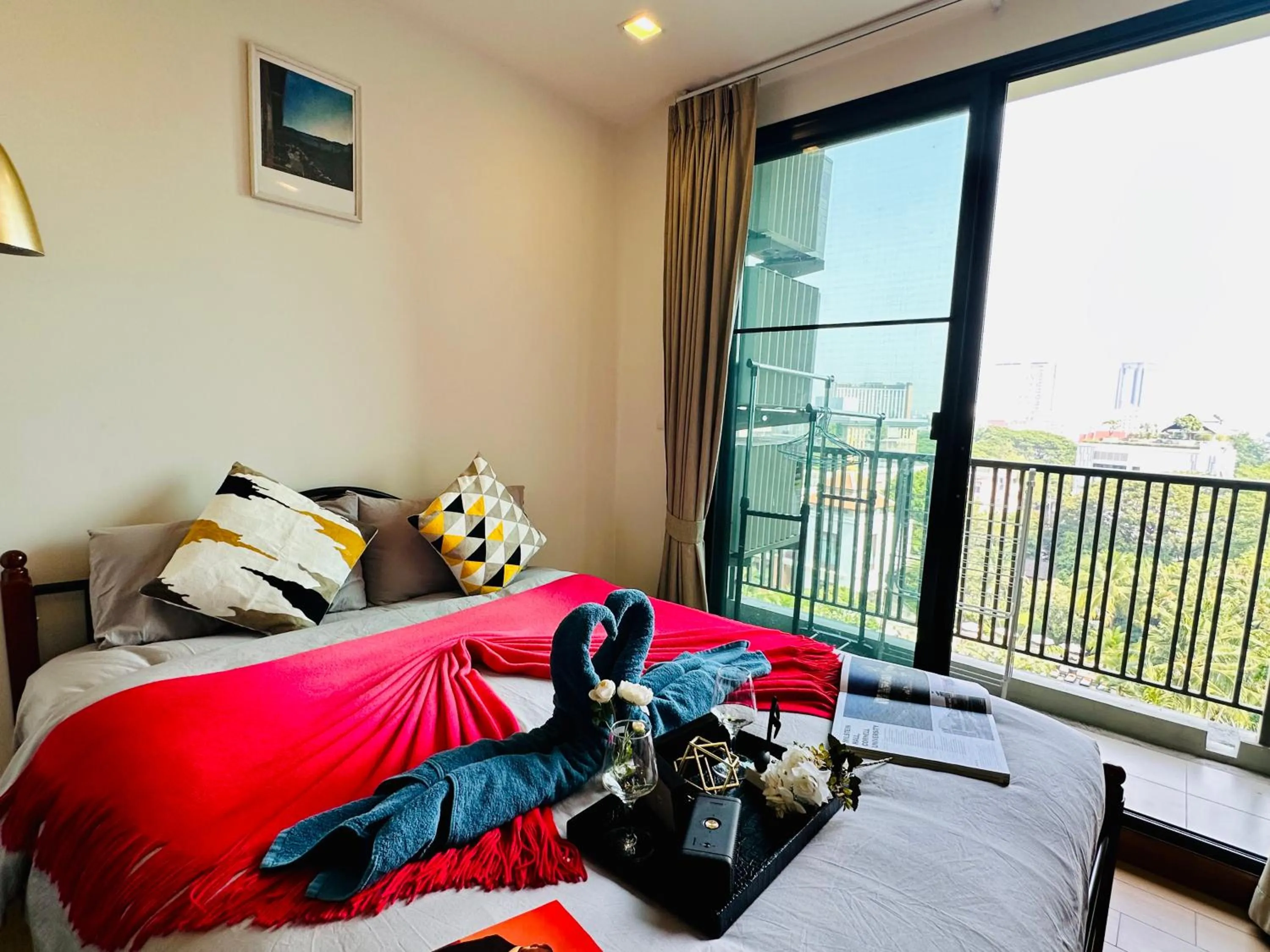 Bed in The Astra Condo Changkhlan in Chiang Mai