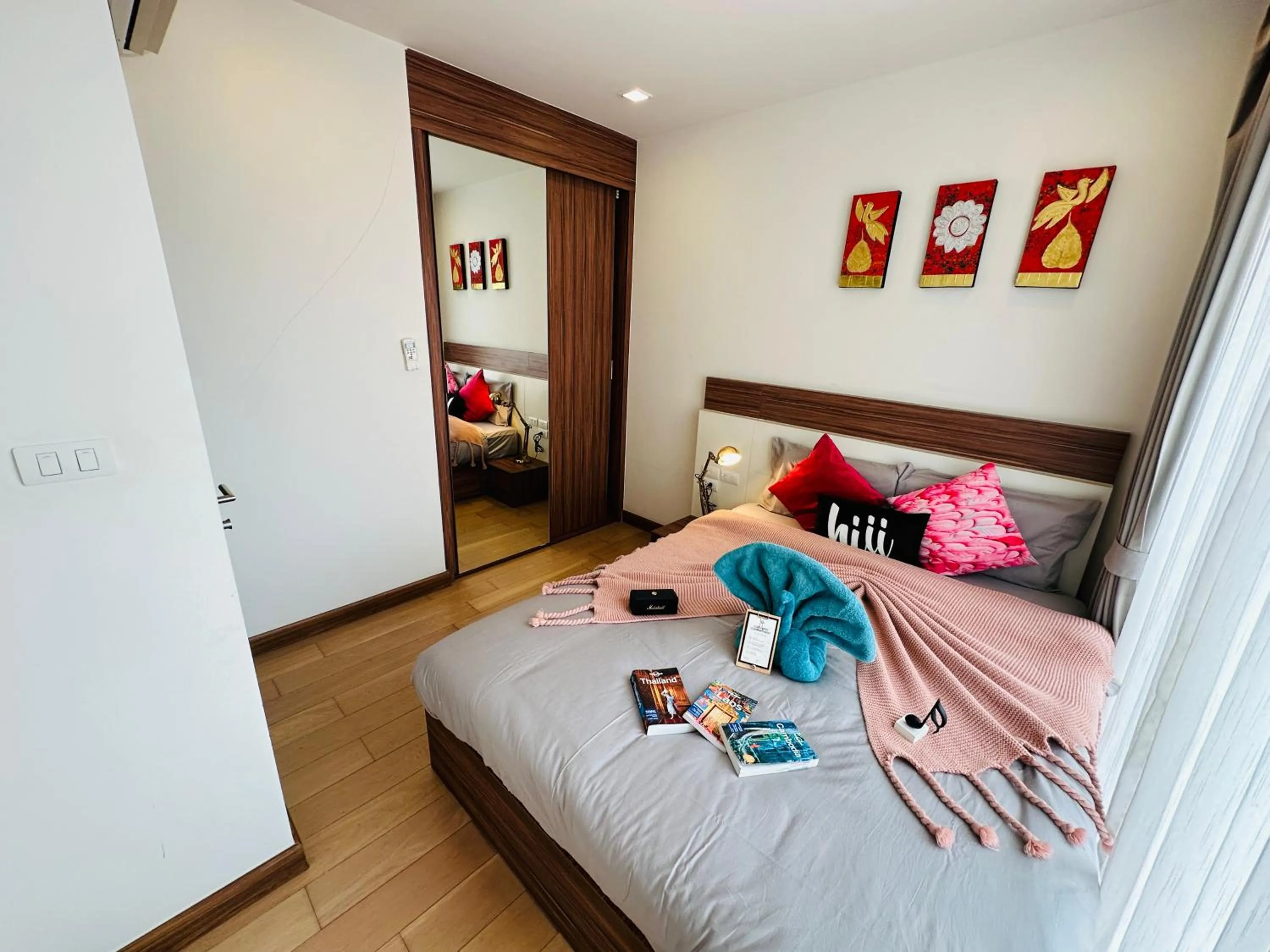 Bed in The Astra Condo Changkhlan in Chiang Mai