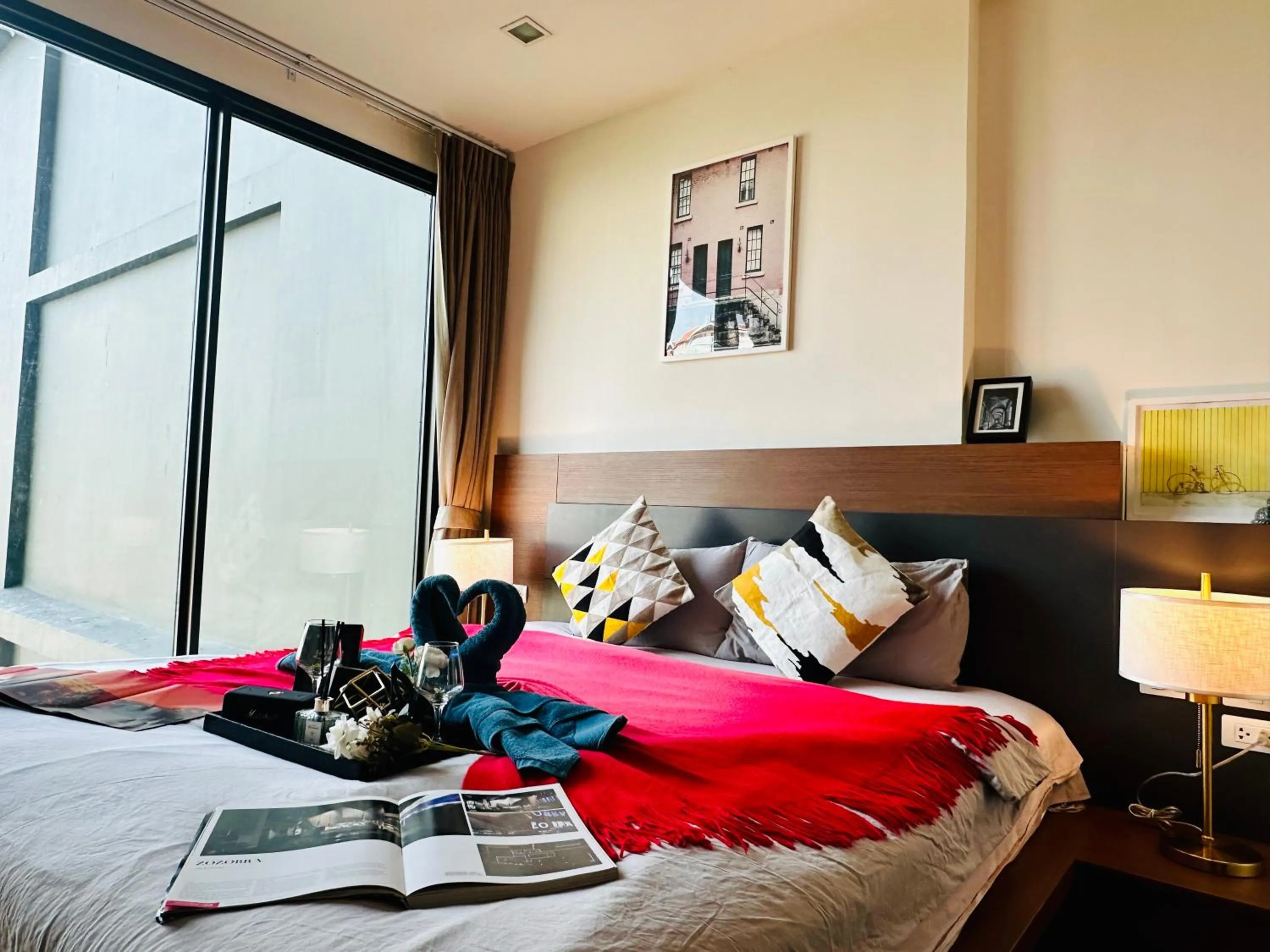 Bed in The Astra Condo Changkhlan in Chiang Mai