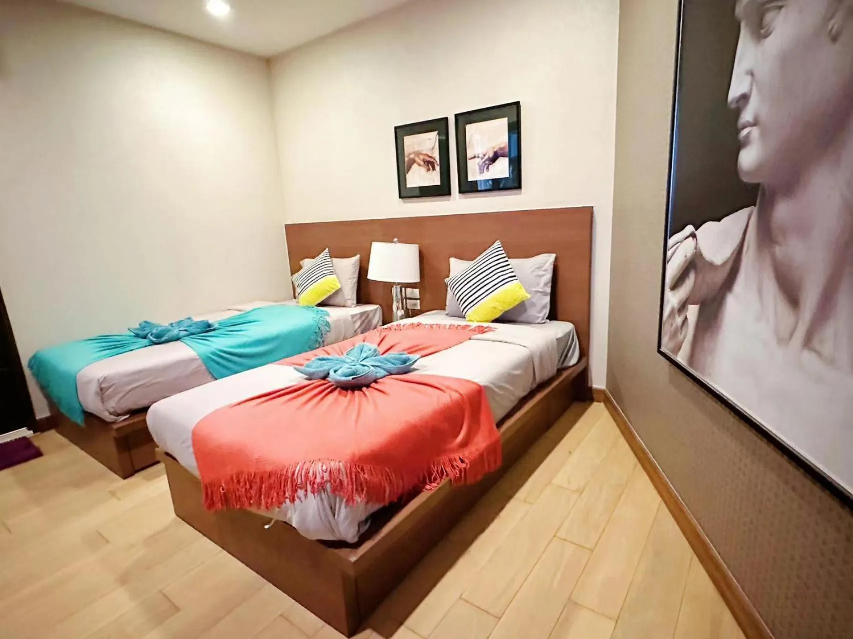 Bed in The Astra Condo Changkhlan in Chiang Mai