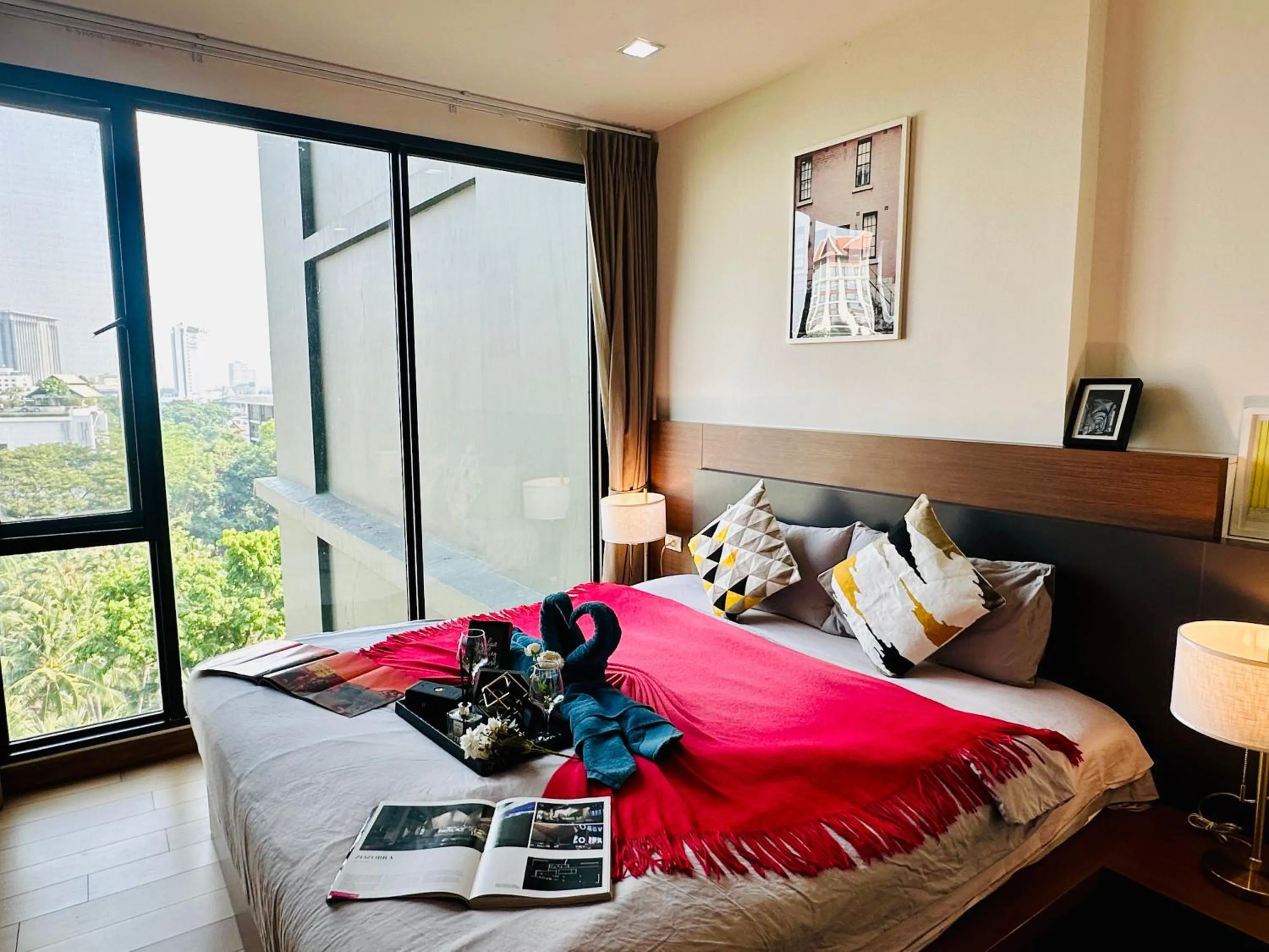 Bed in The Astra Condo Changkhlan in Chiang Mai