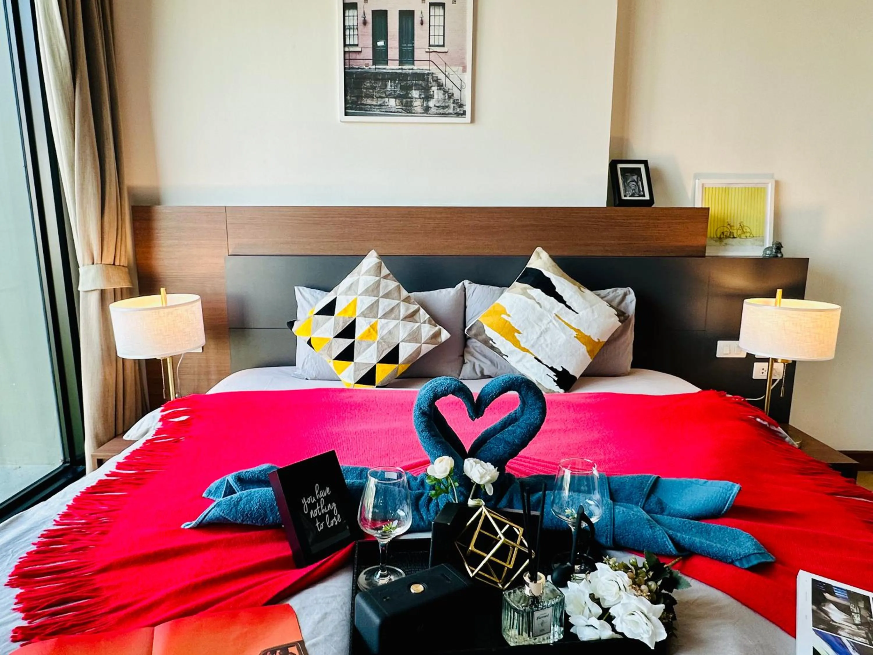 Bed in The Astra Condo Changkhlan in Chiang Mai