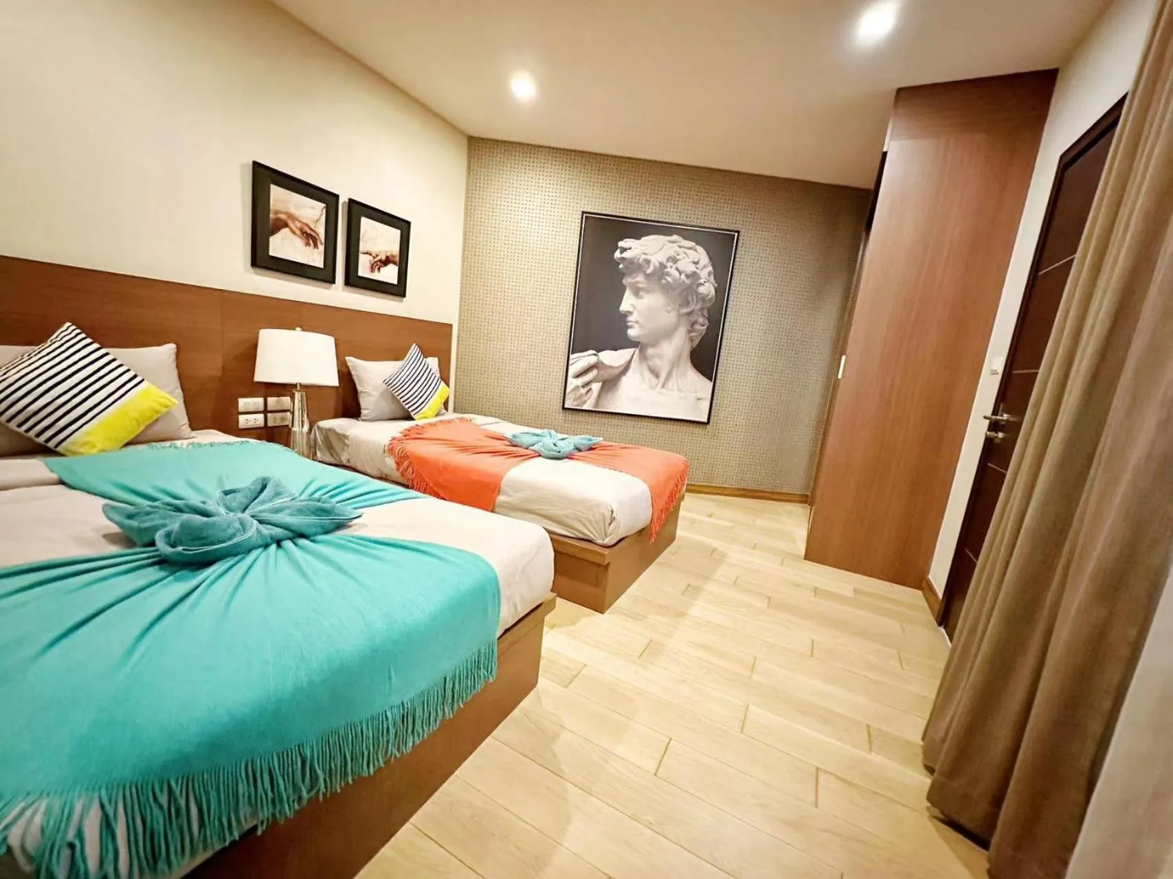 Bed in The Astra Condo Changkhlan in Chiang Mai