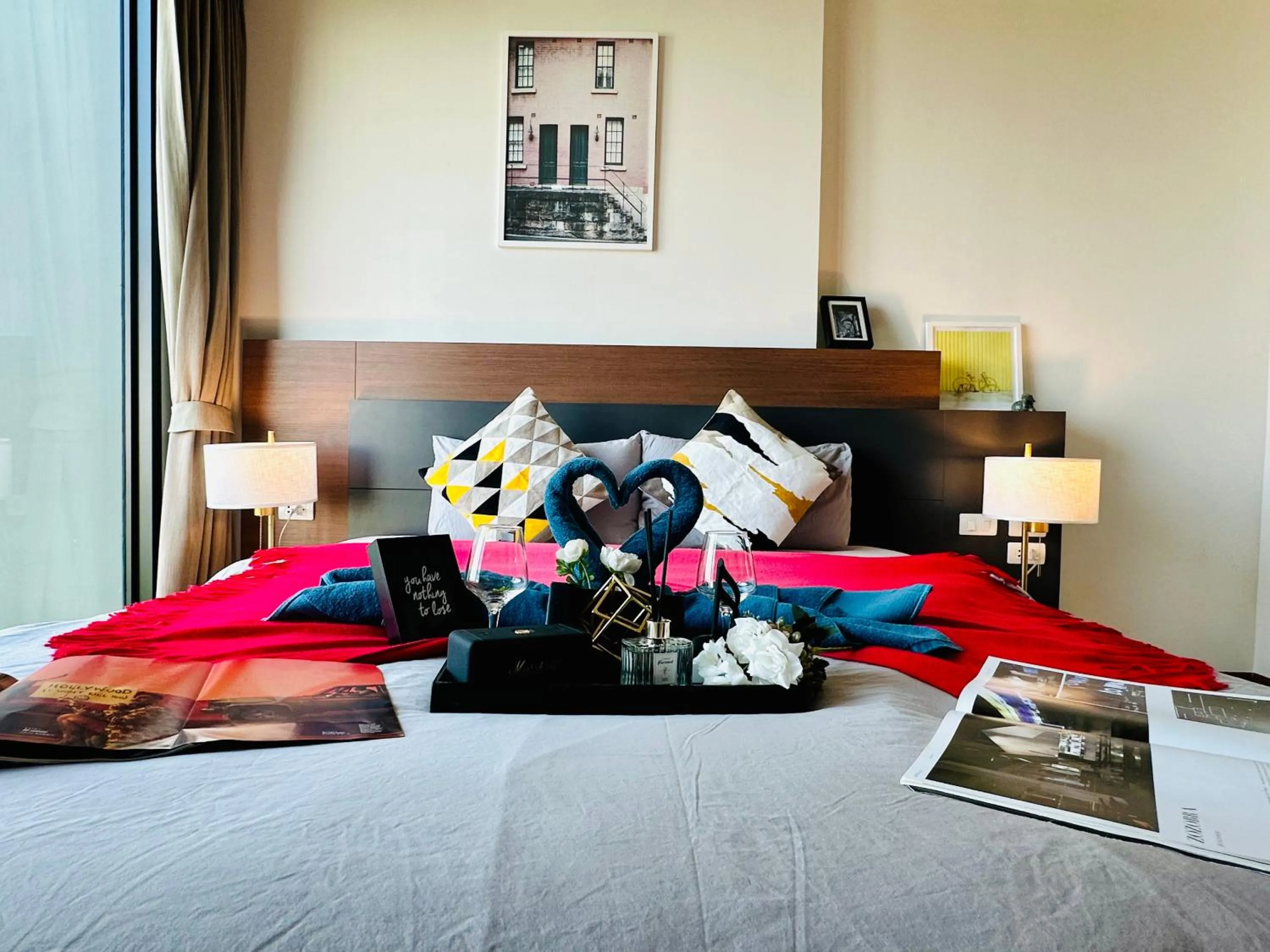 Bed in The Astra Condo Changkhlan in Chiang Mai