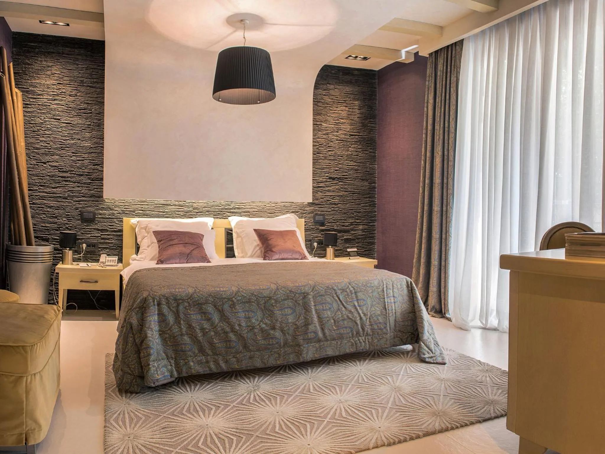 Bed in Hotel Forza Mare