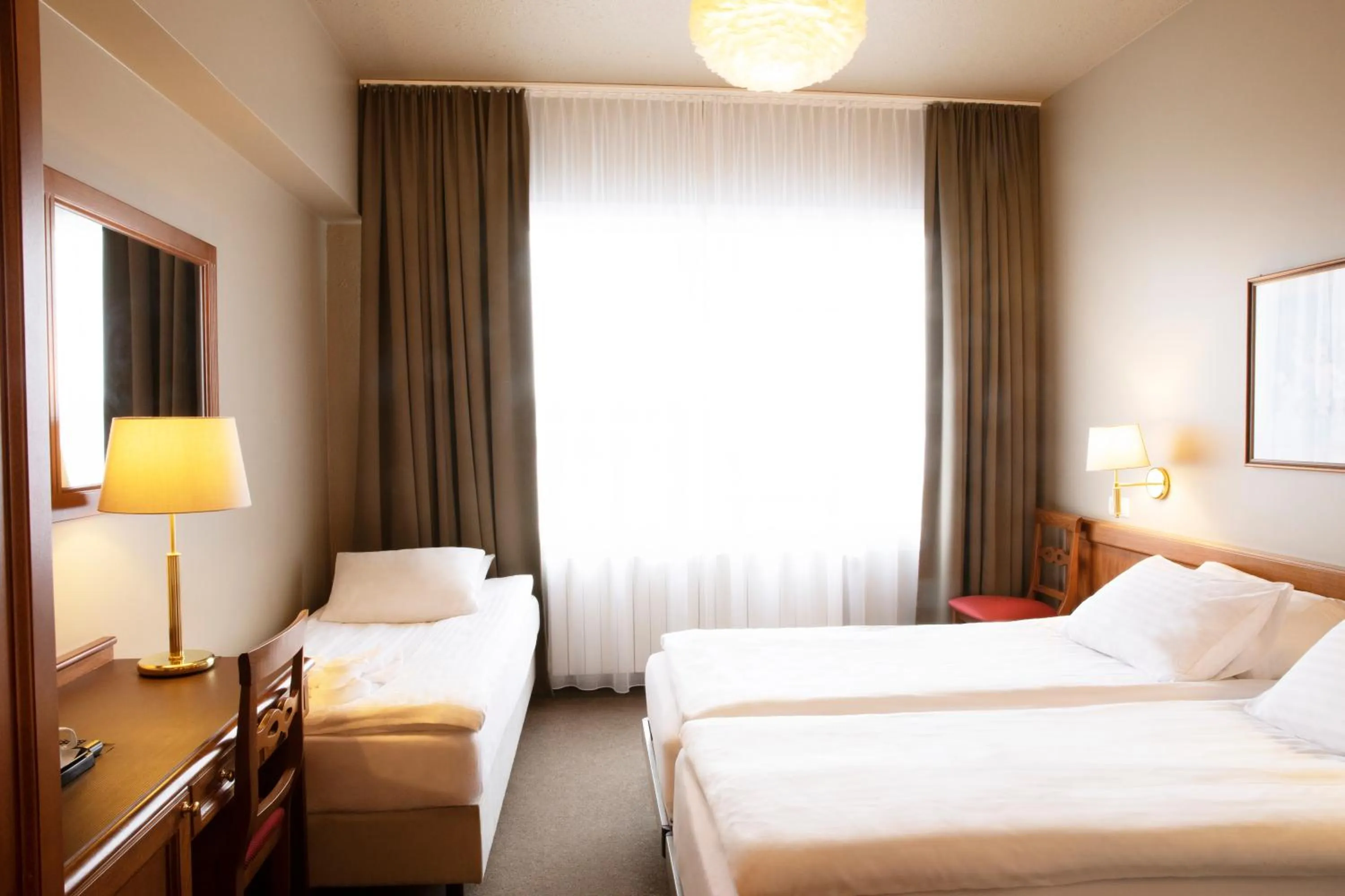 Bed in Fosshotel Stykkisholmur