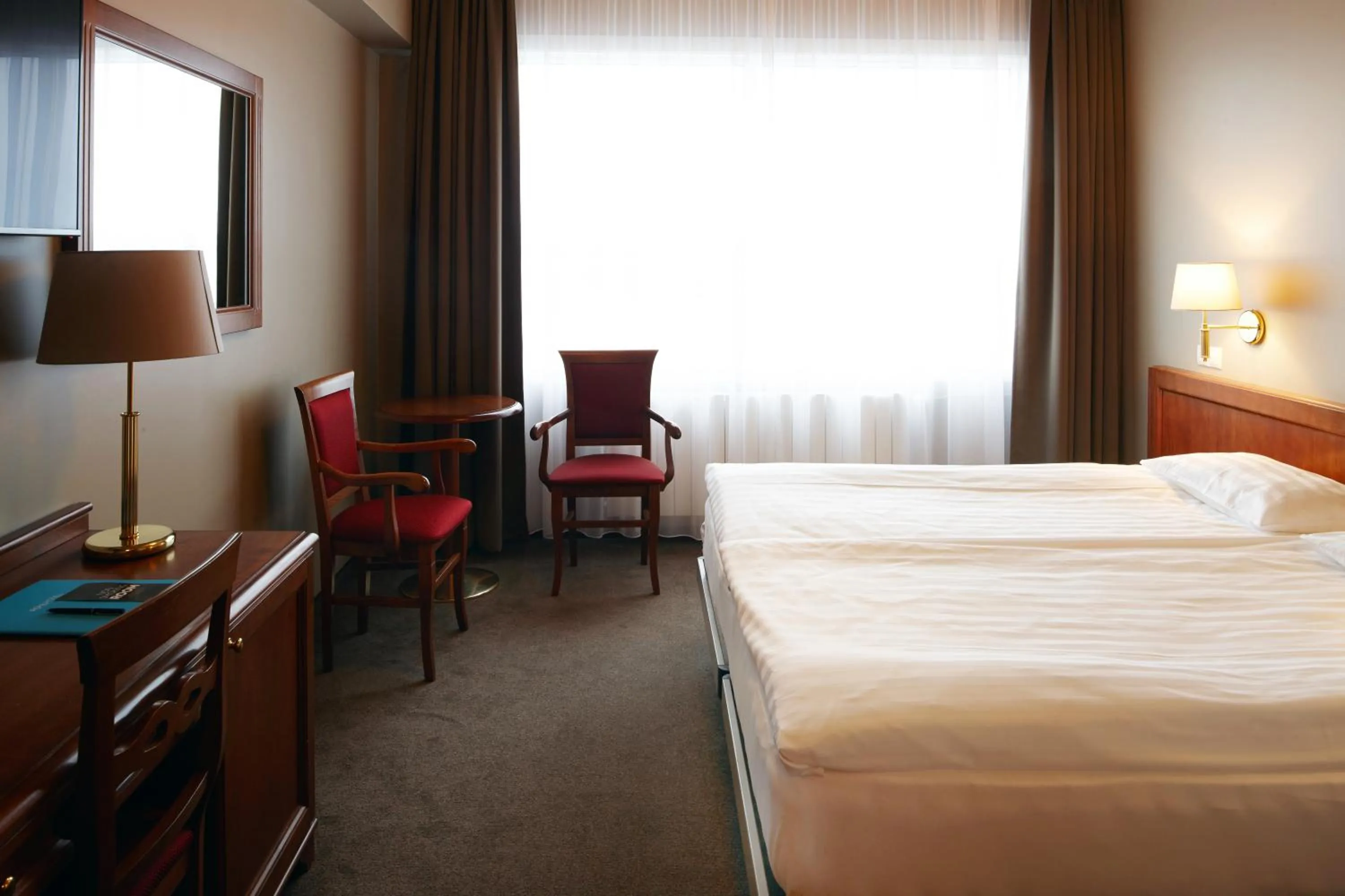 Seating area, Bed in Fosshotel Stykkisholmur