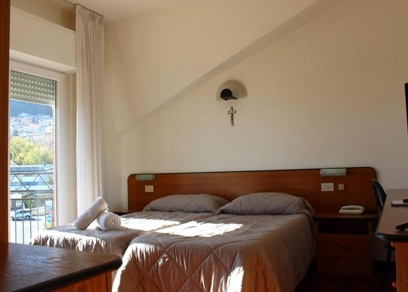 Bed in Hotel Crocenzi