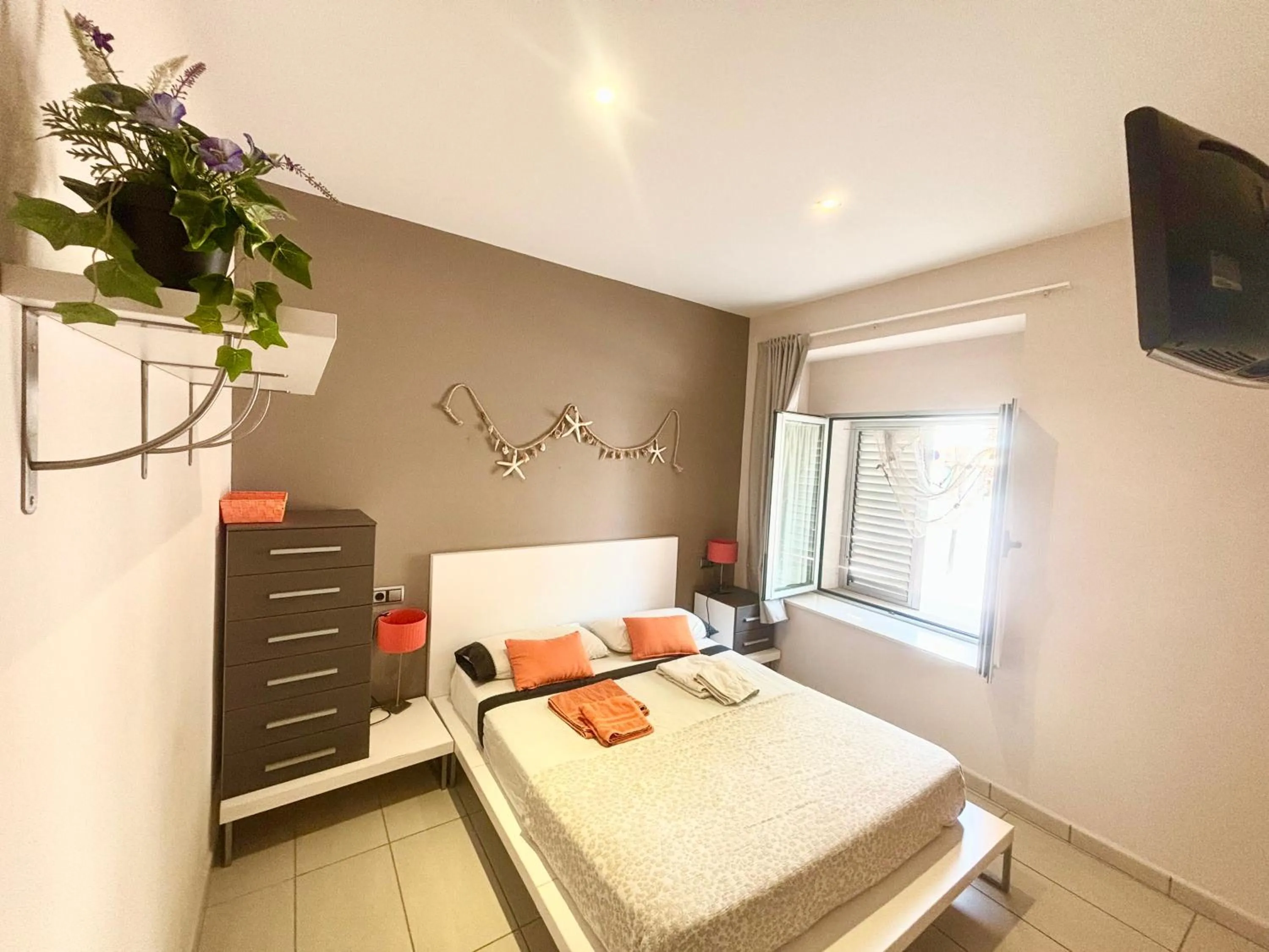 Bed in Increíble casa frente al mar , planta baja