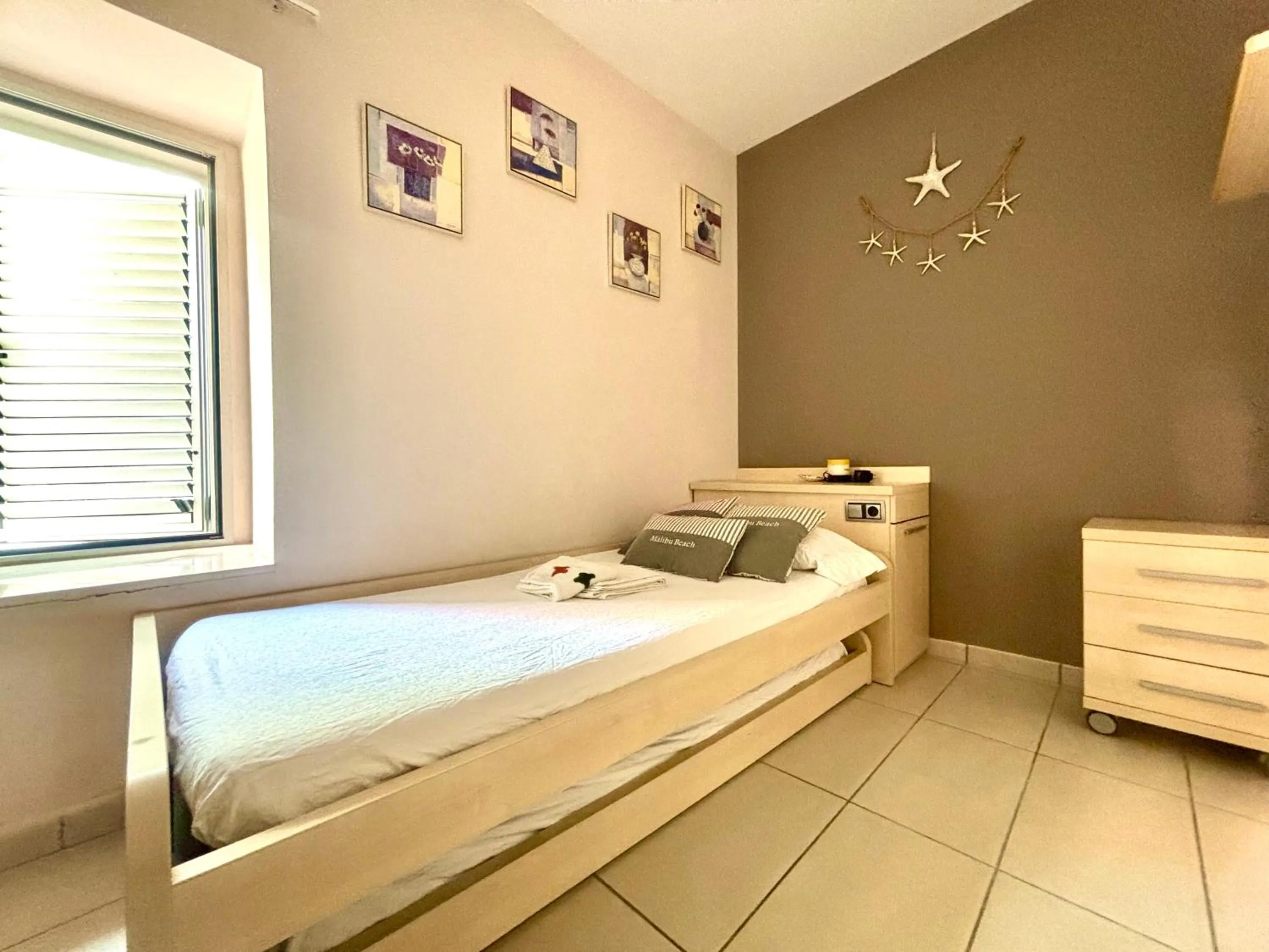 Bed in Increíble casa frente al mar , planta baja