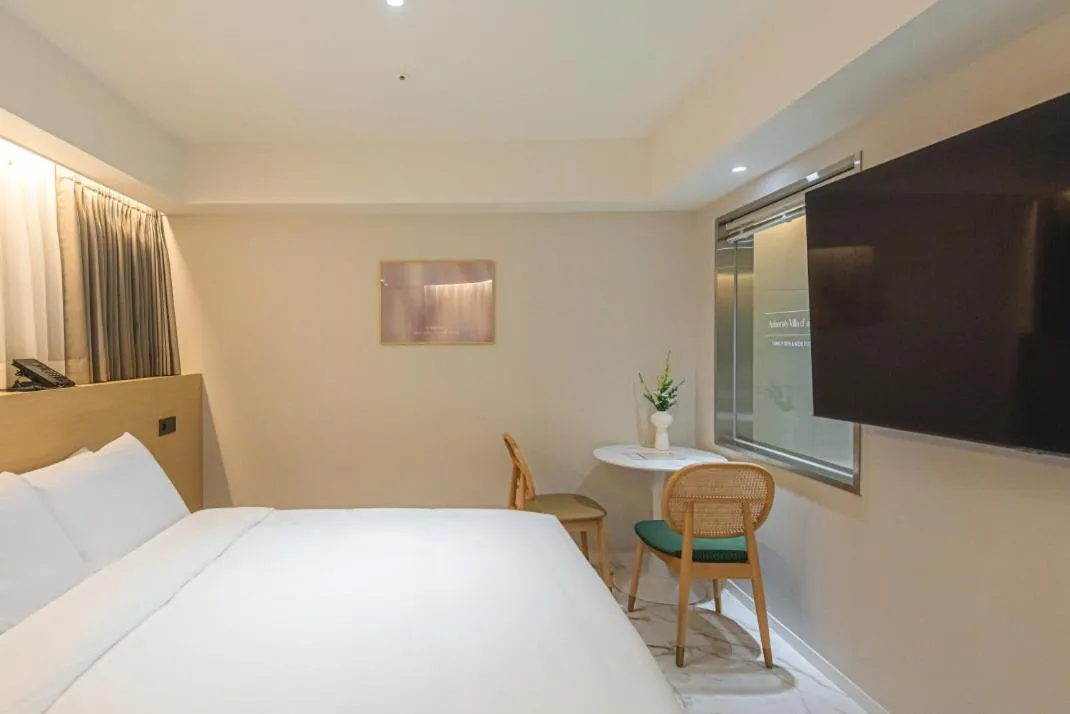 Bed in Asherah Villa d' aqua Hotel