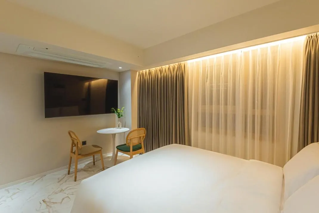 Bed in Asherah Villa d' aqua Hotel