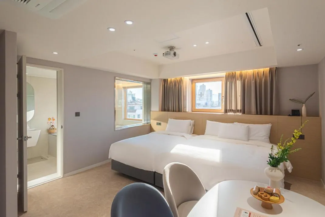 Bed in Asherah Villa d' aqua Hotel