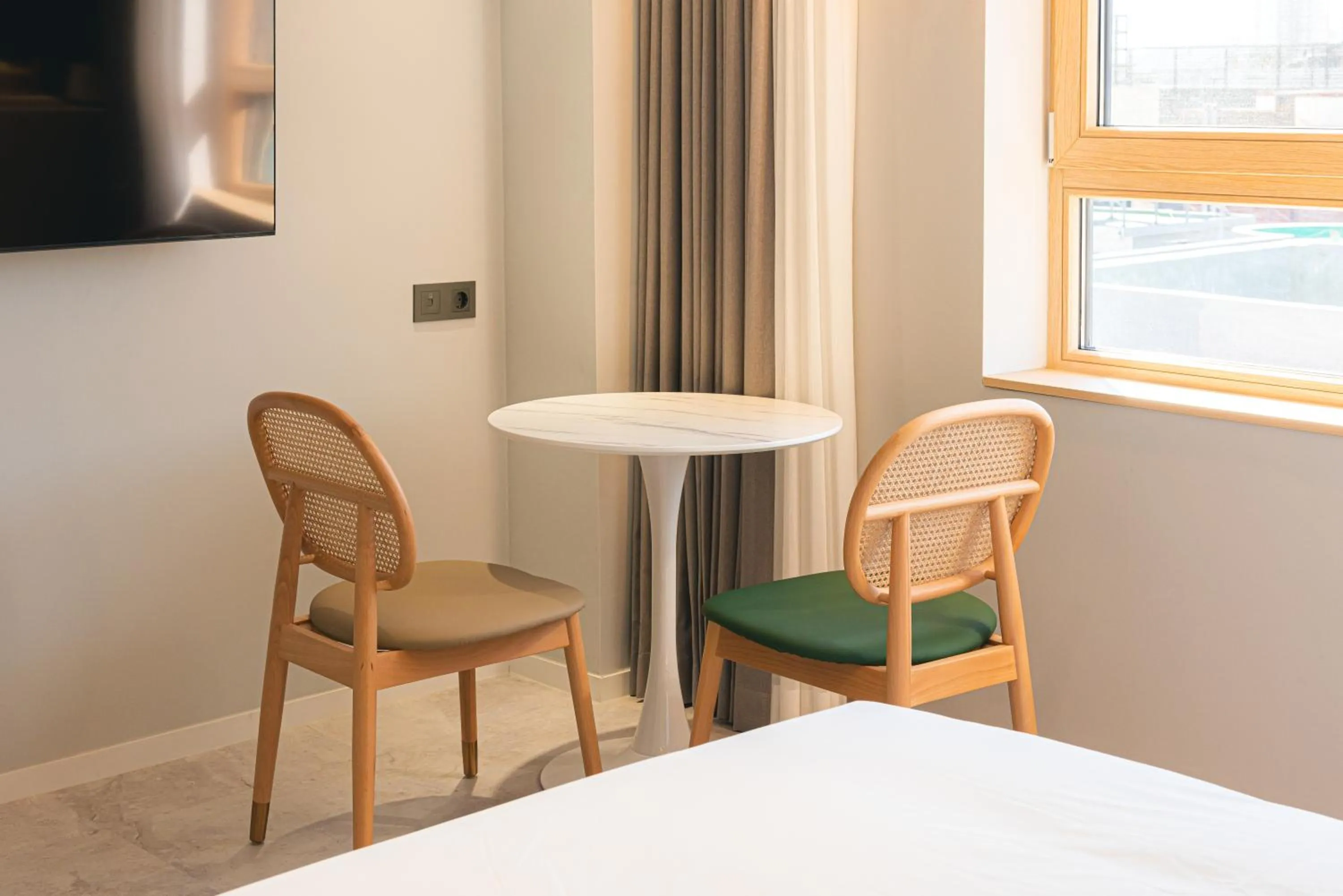 Bed in Asherah Villa d' aqua Hotel