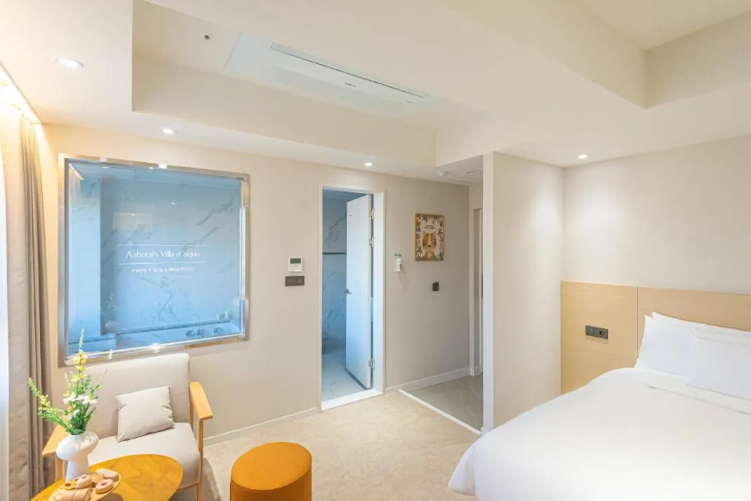 Bed in Asherah Villa d' aqua Hotel