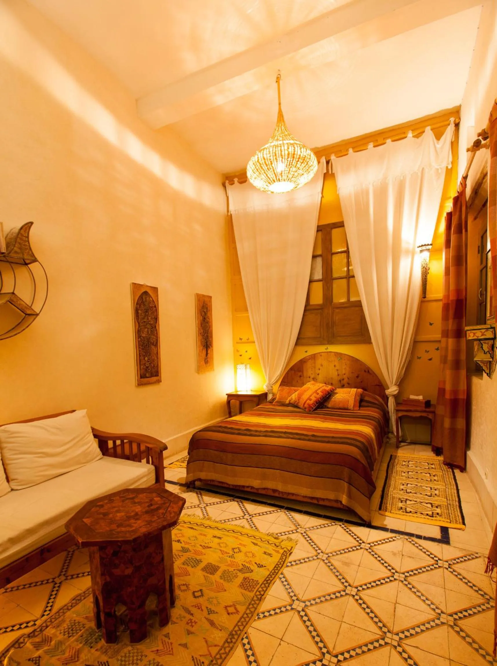 Living room, Bed in Riad Al Zahia