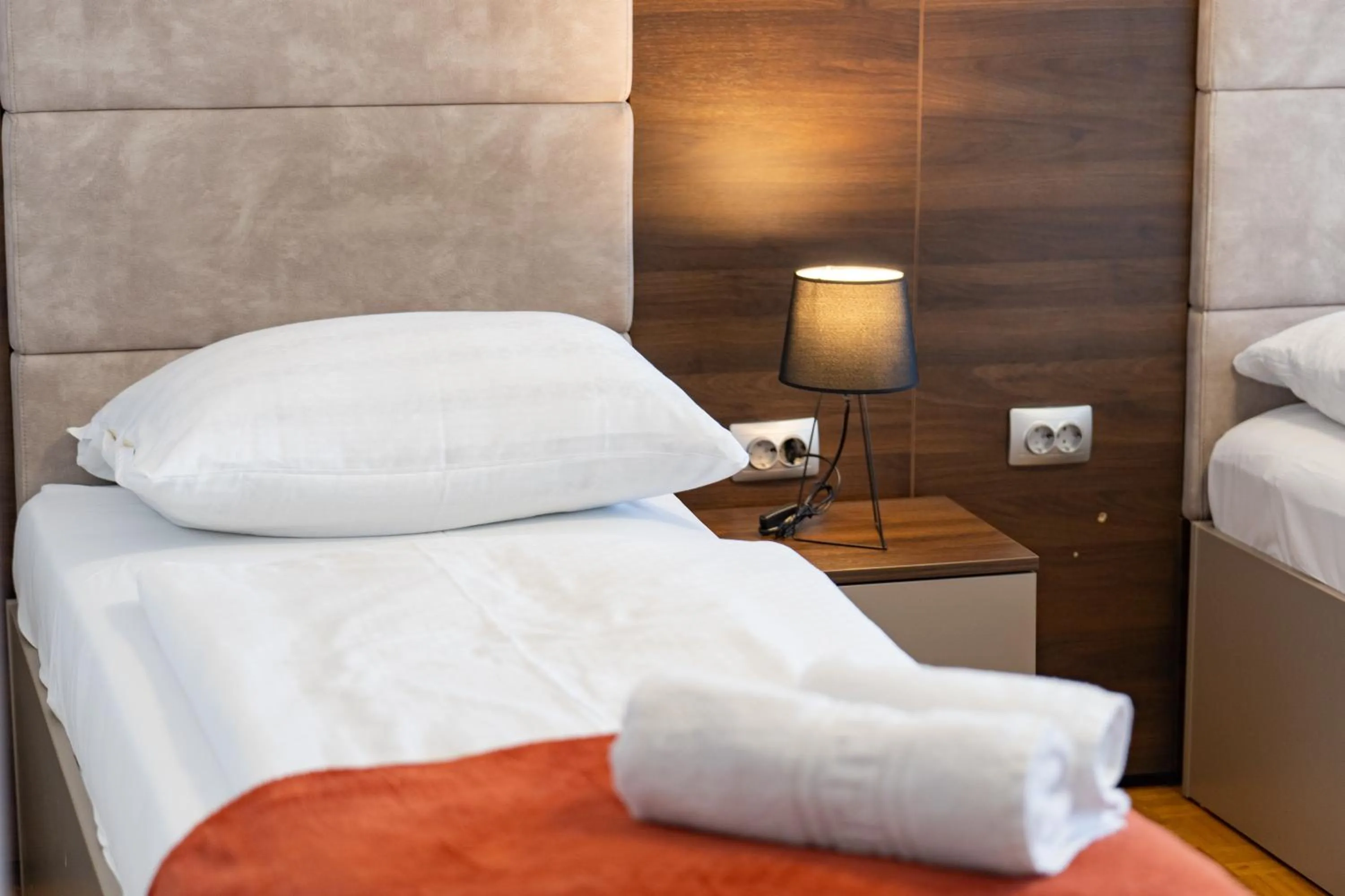 Bed in Artearia Hotel