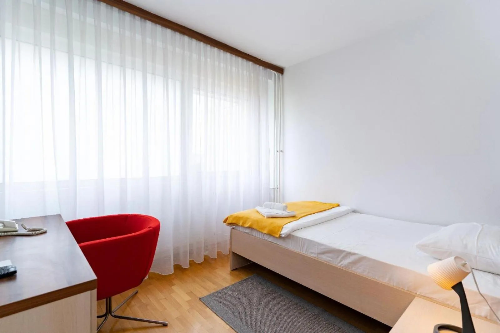 Bed in Artearia Hotel