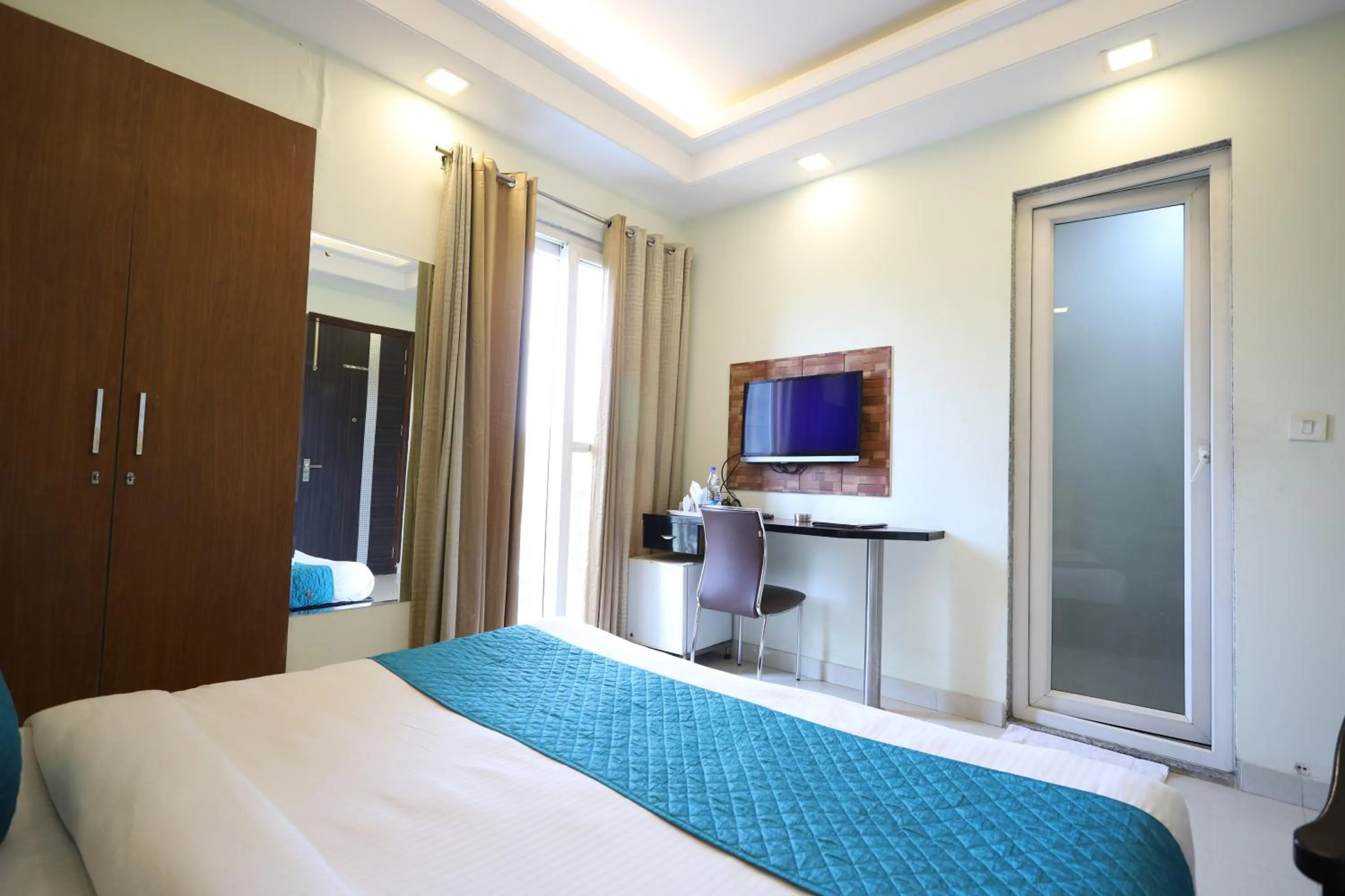 Bedroom, Bed in Asian Suites Cyber Park Gurgaon