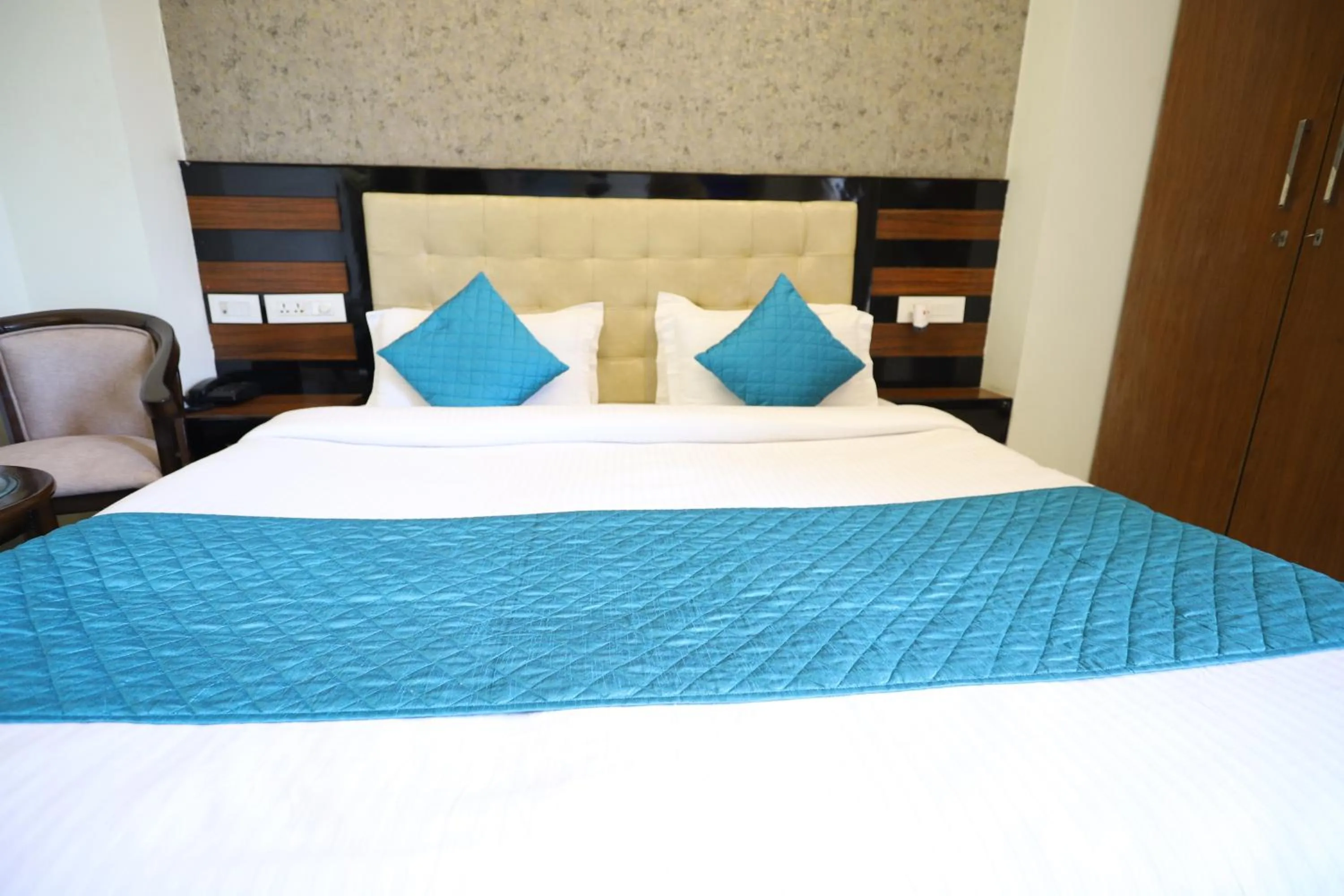 Bed in Asian Suites Cyber Park Gurgaon