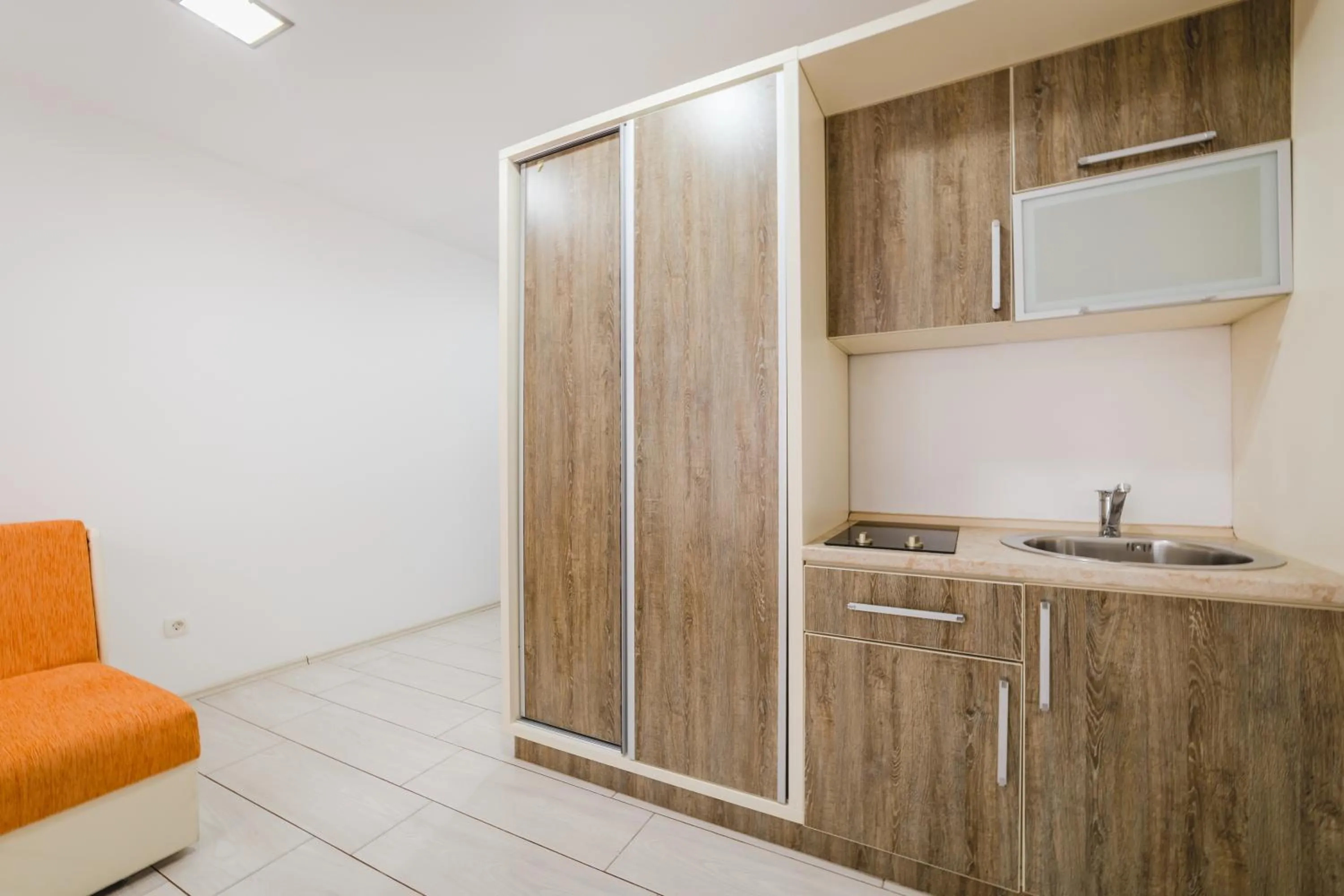 Kitchen or kitchenette in Hotel & Apartments HEC Residence