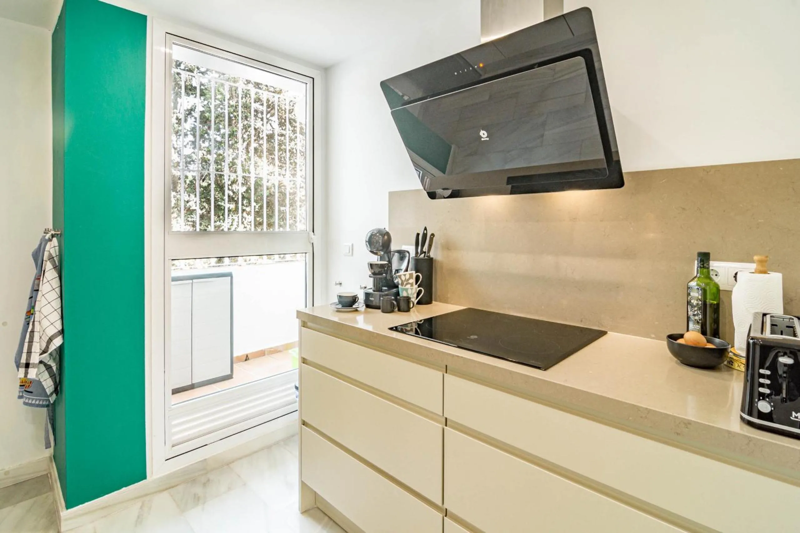 Kitchen or kitchenette in Andalusian Elegance apartment in El Paraiso with 360 views over Sea and Mountains