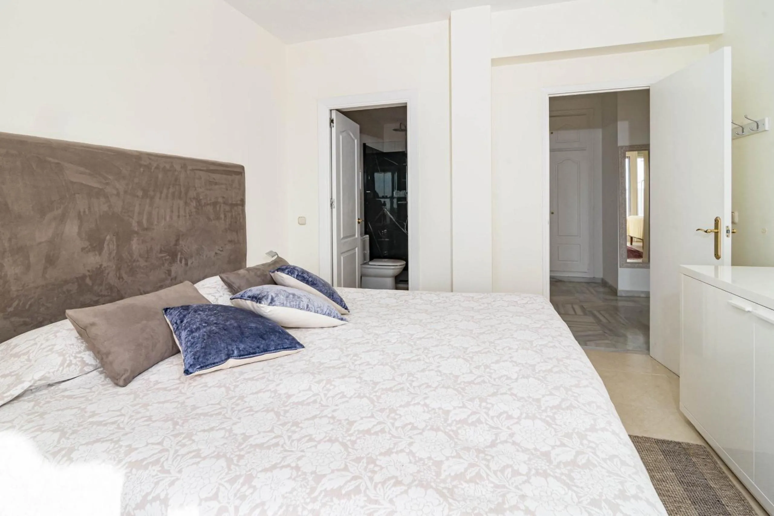 Bed in Andalusian Elegance apartment in El Paraiso with 360 views over Sea and Mountains