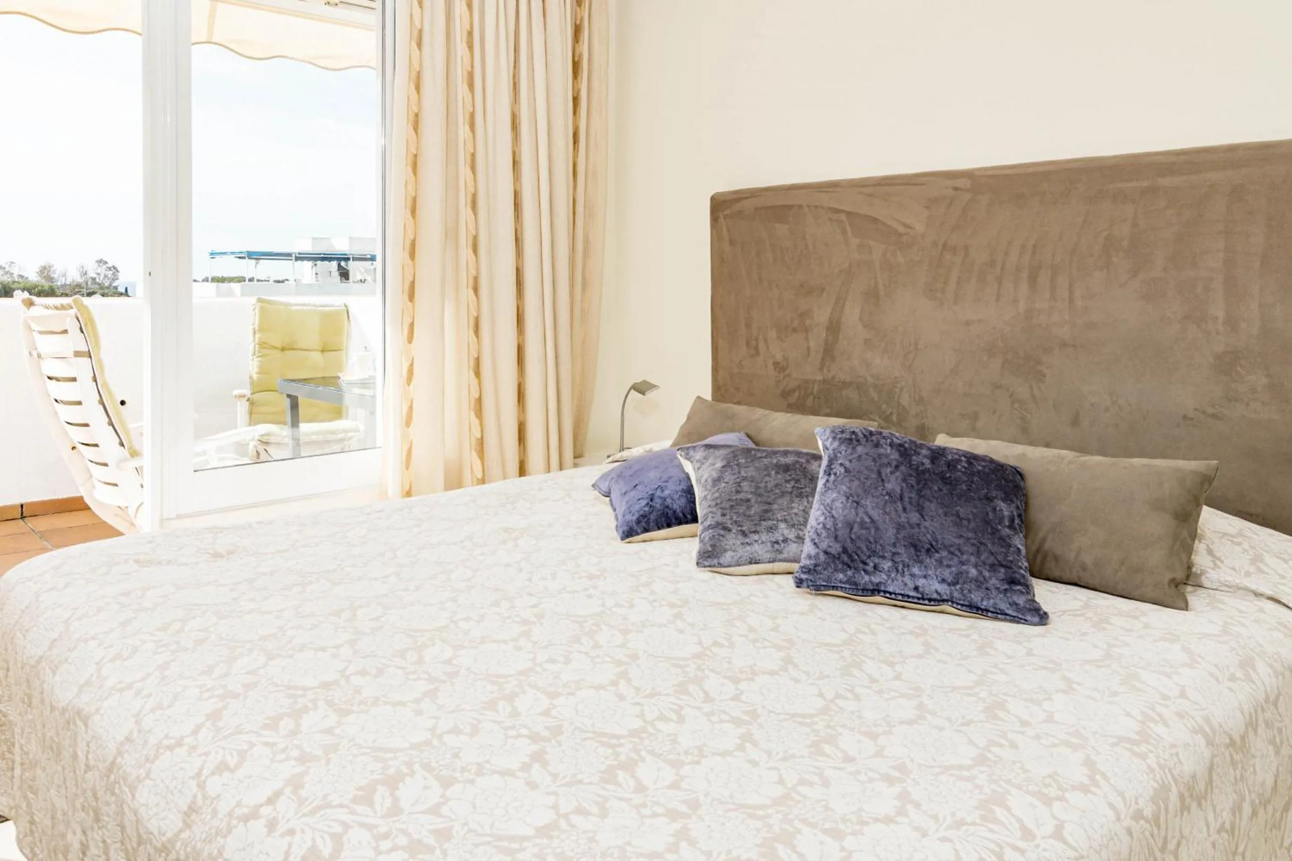 Bed in Andalusian Elegance apartment in El Paraiso with 360 views over Sea and Mountains