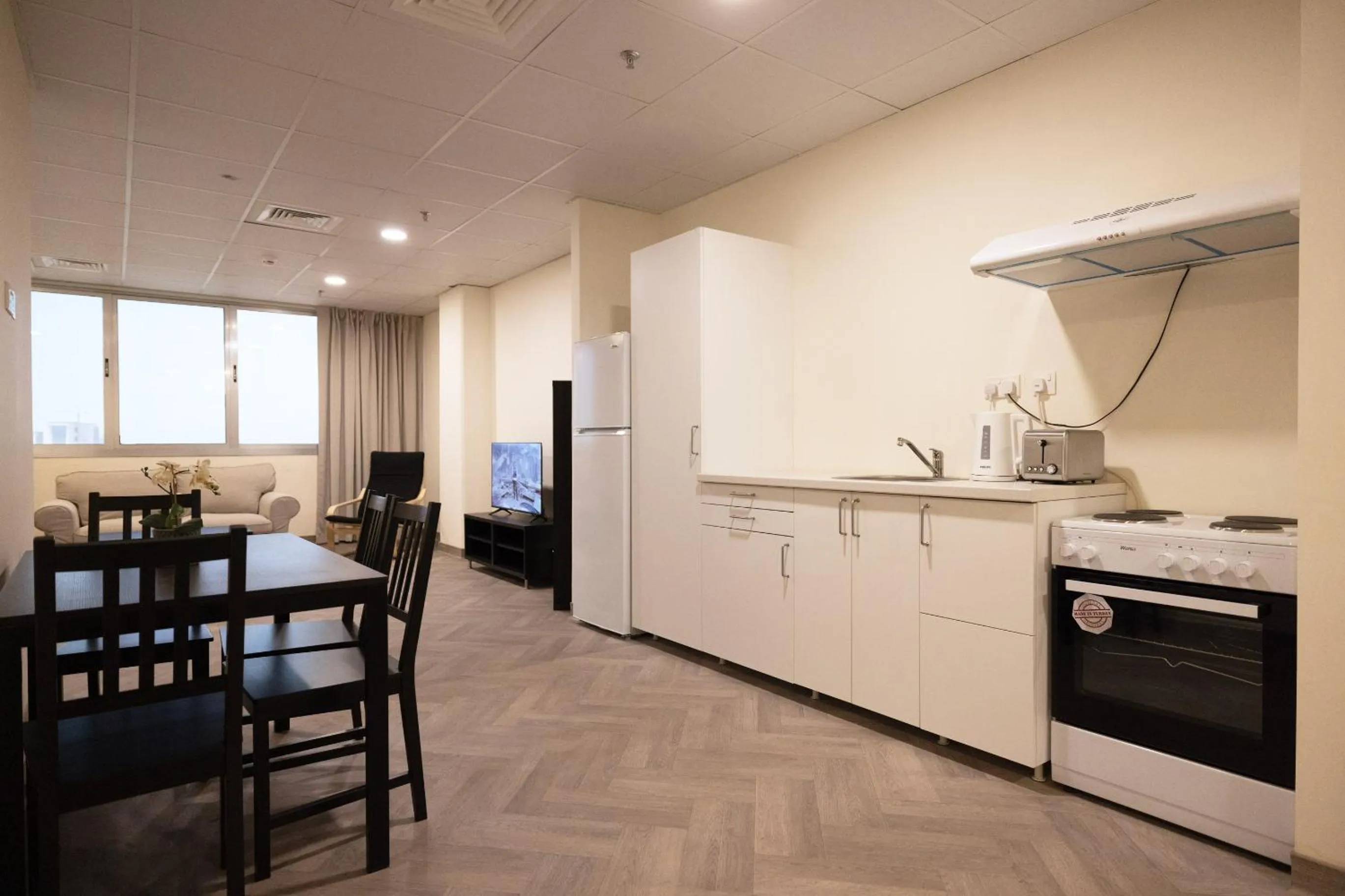 Kitchen or kitchenette in Riggae Tower Hotel