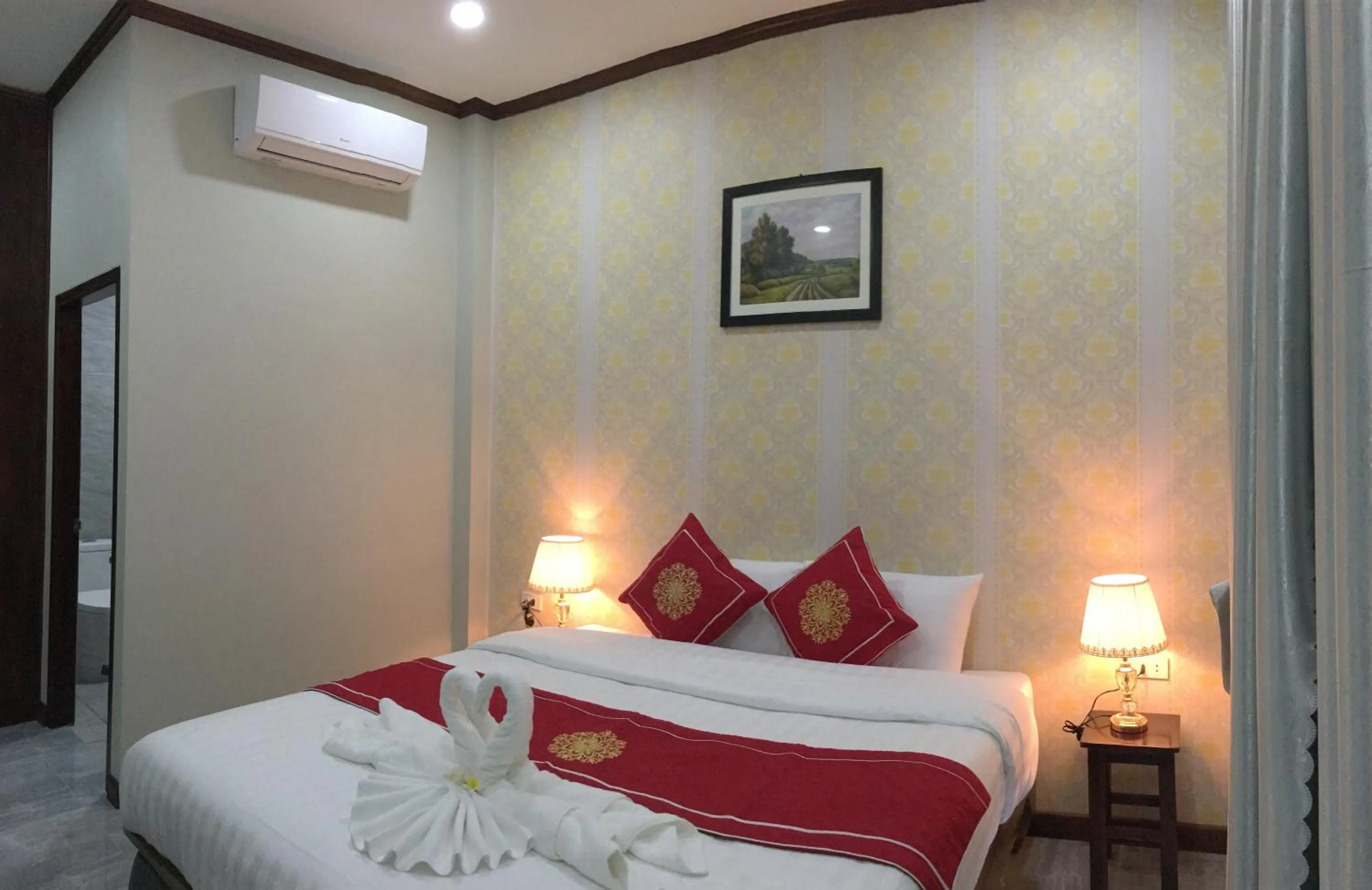 Bed in Le KhounSok Boutique Hotel