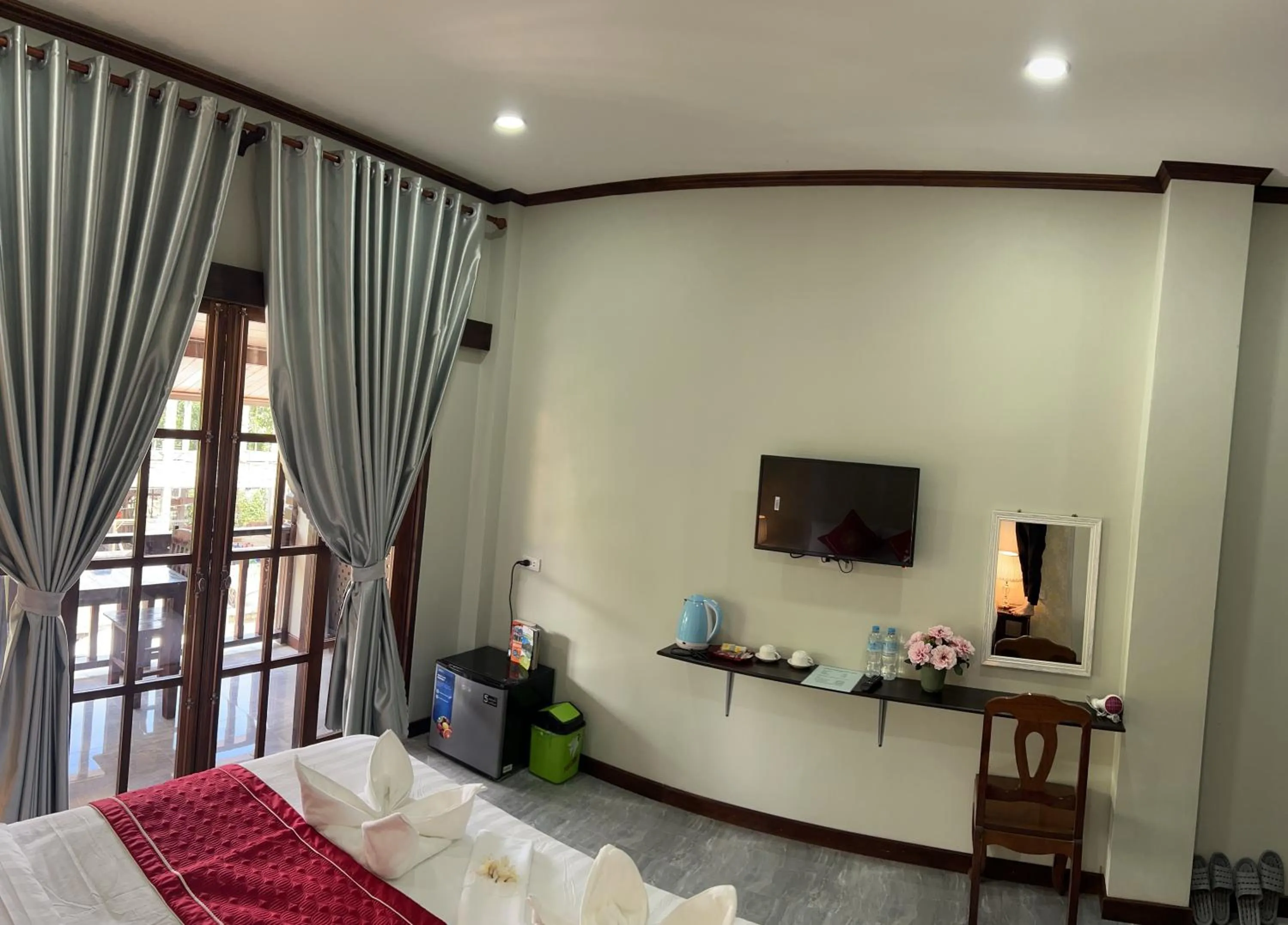 Bed in Le KhounSok Boutique Hotel