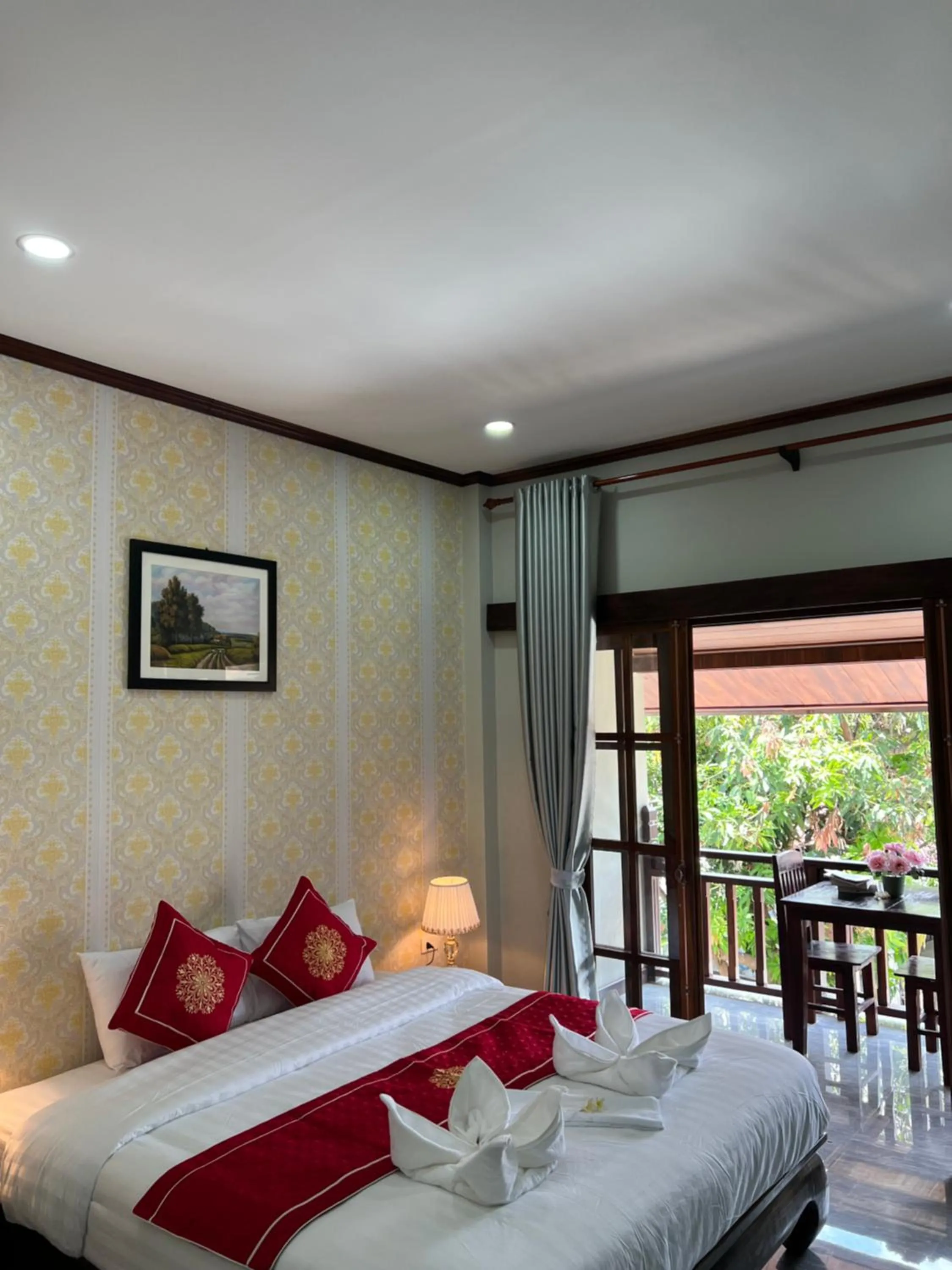 Bed in Le KhounSok Boutique Hotel