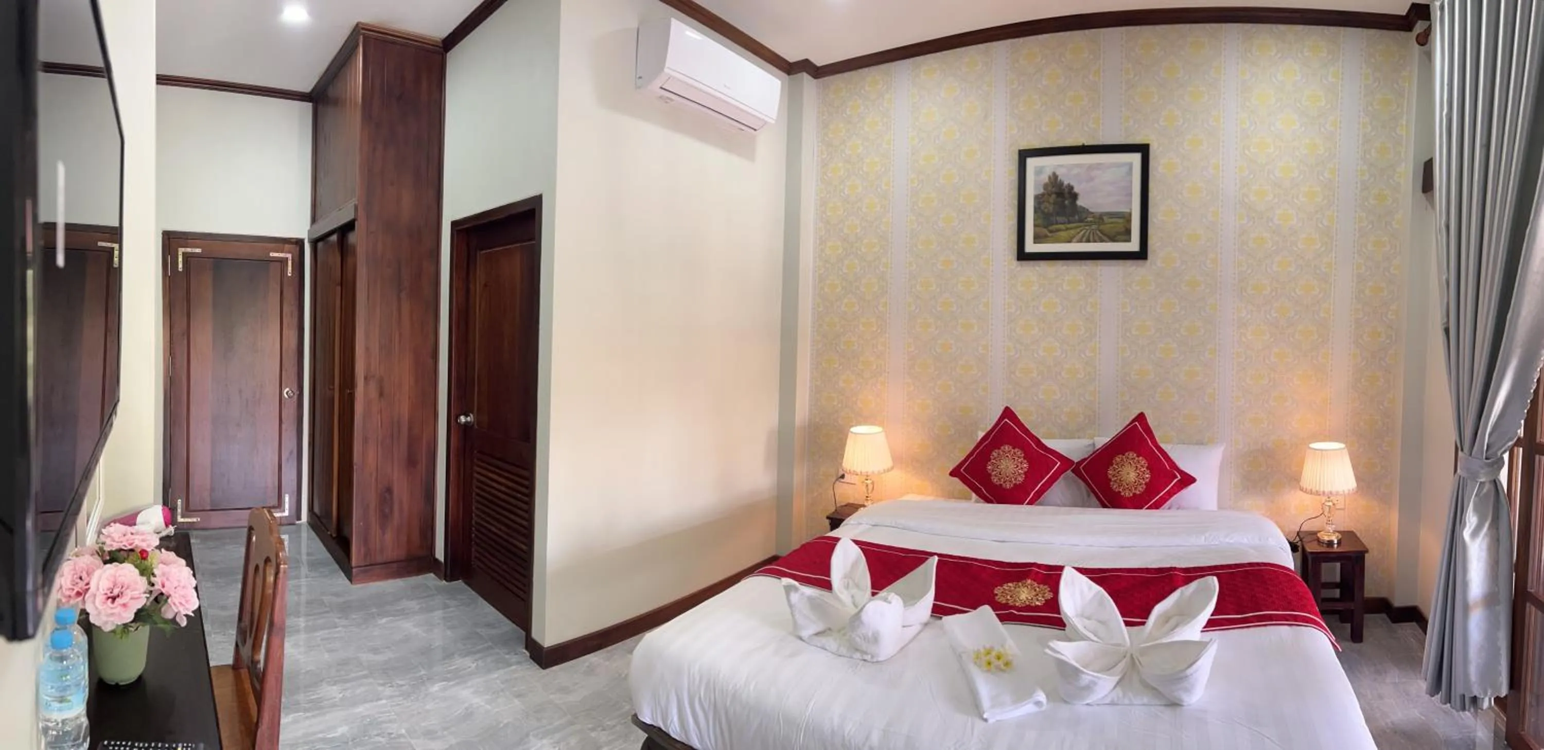 Bed in Le KhounSok Boutique Hotel