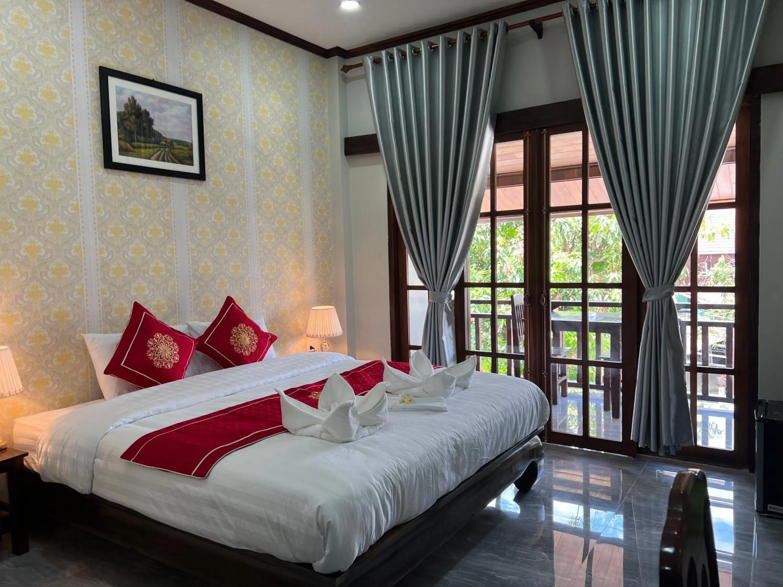 Bed in Le KhounSok Boutique Hotel