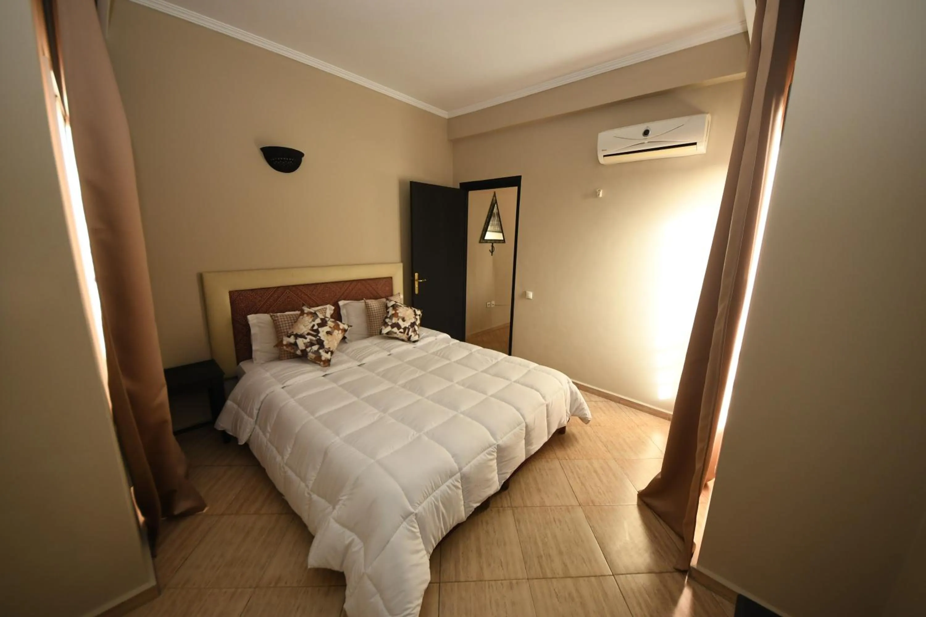 Bedroom, Bed in Agyad Maroc Appart-Hotel