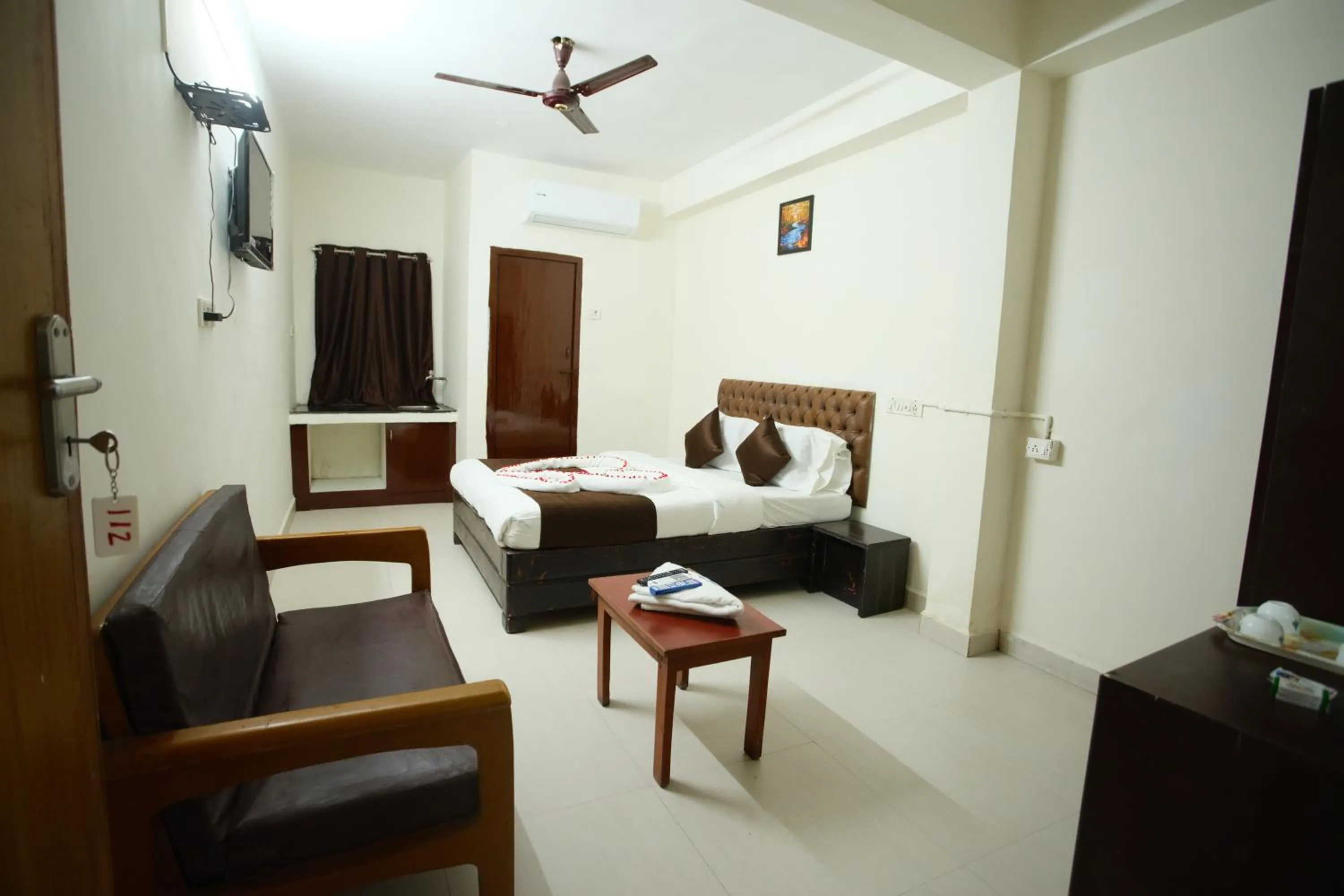 Bed in Ganesh Guest House