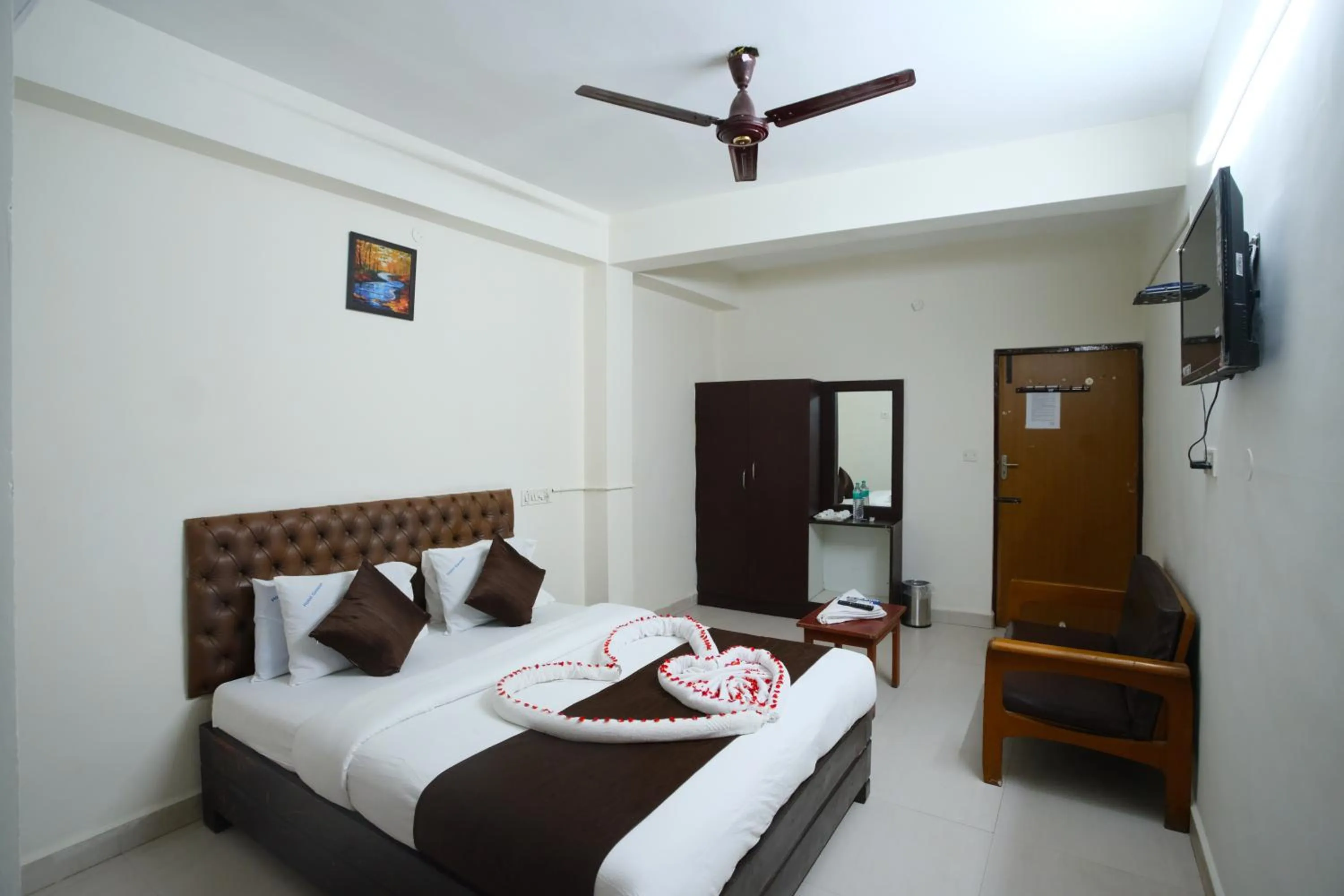 Bed in Ganesh Guest House