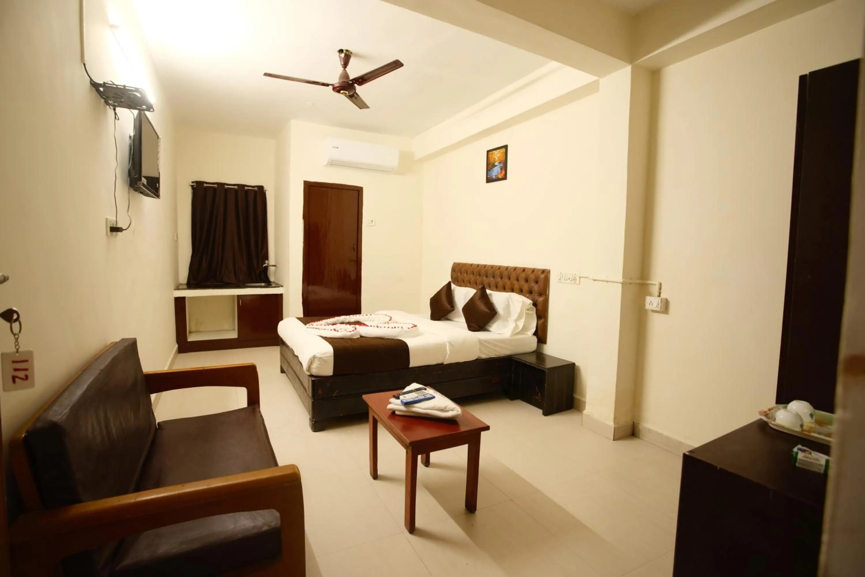 Bed in Ganesh Guest House