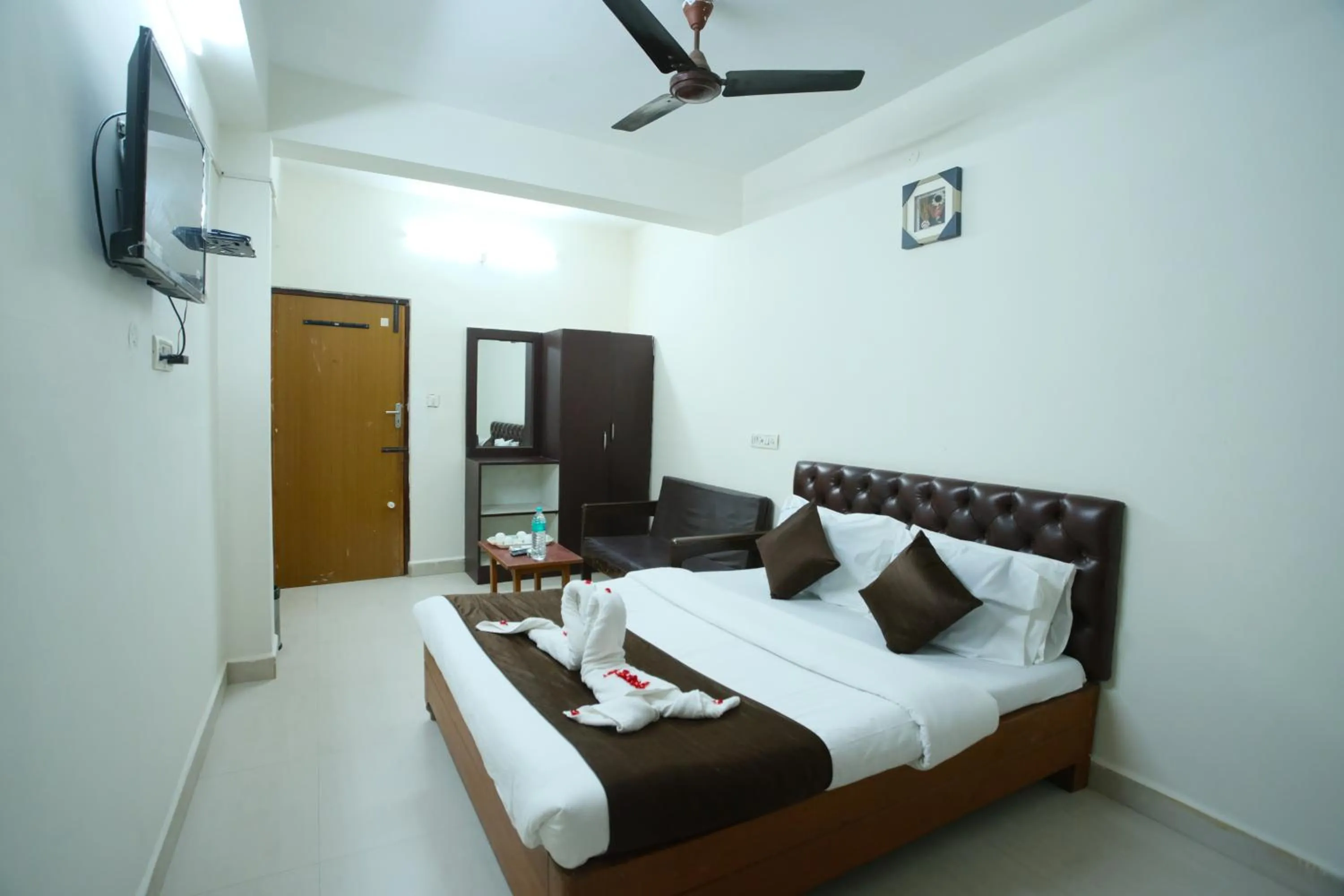 Bed in Ganesh Guest House
