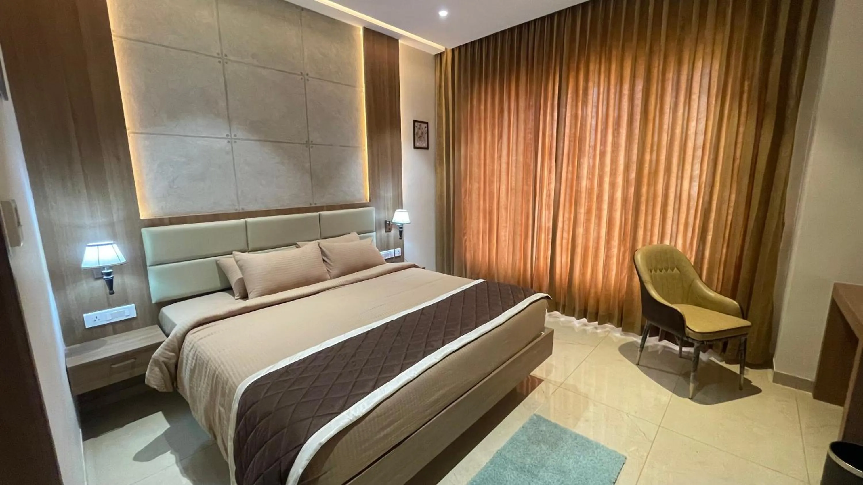 Bed in HOTEL VAHINI GRAND