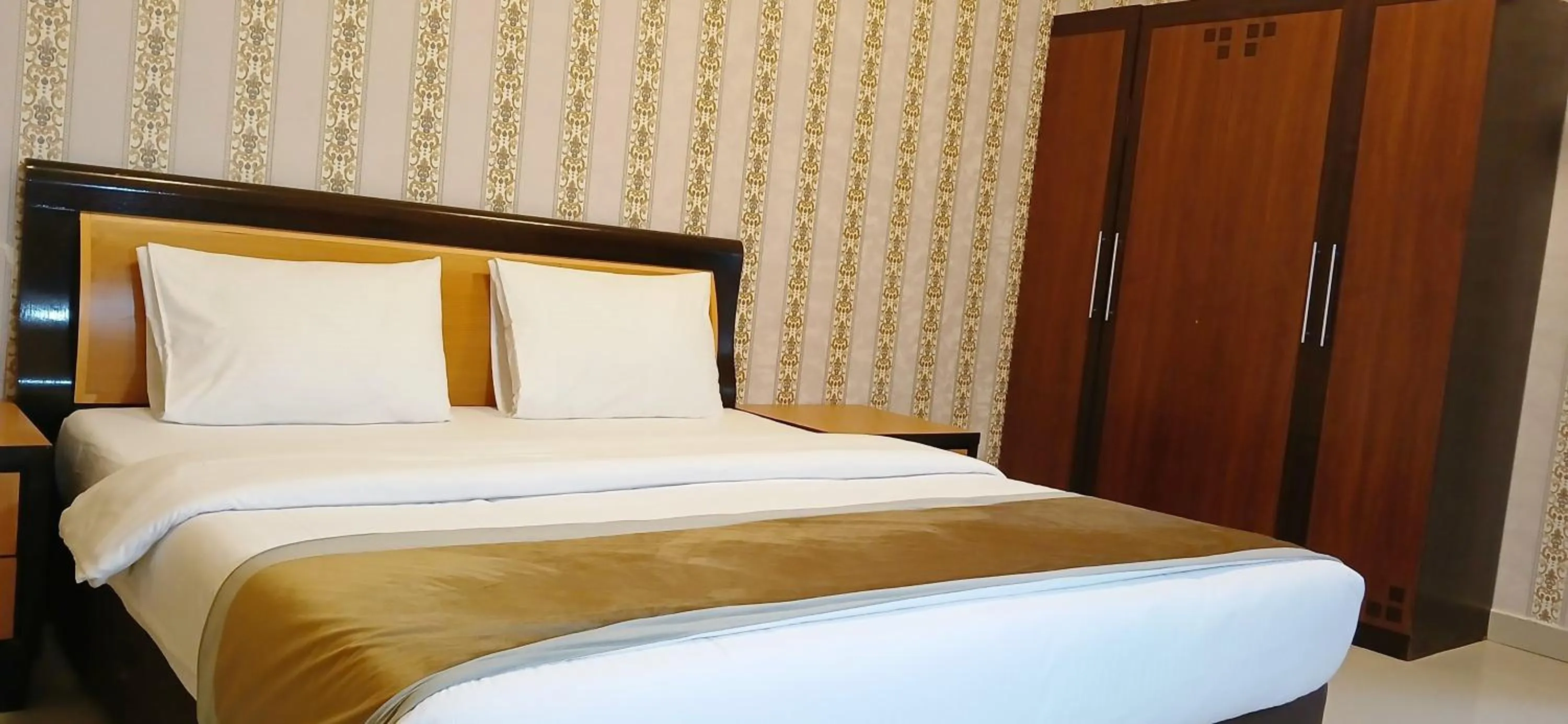 Bed in AL MARJAN FURNISHED APARTMENTS