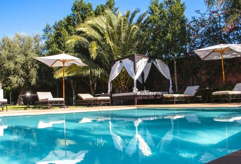 Swimming pool in Palais El Miria & SPA