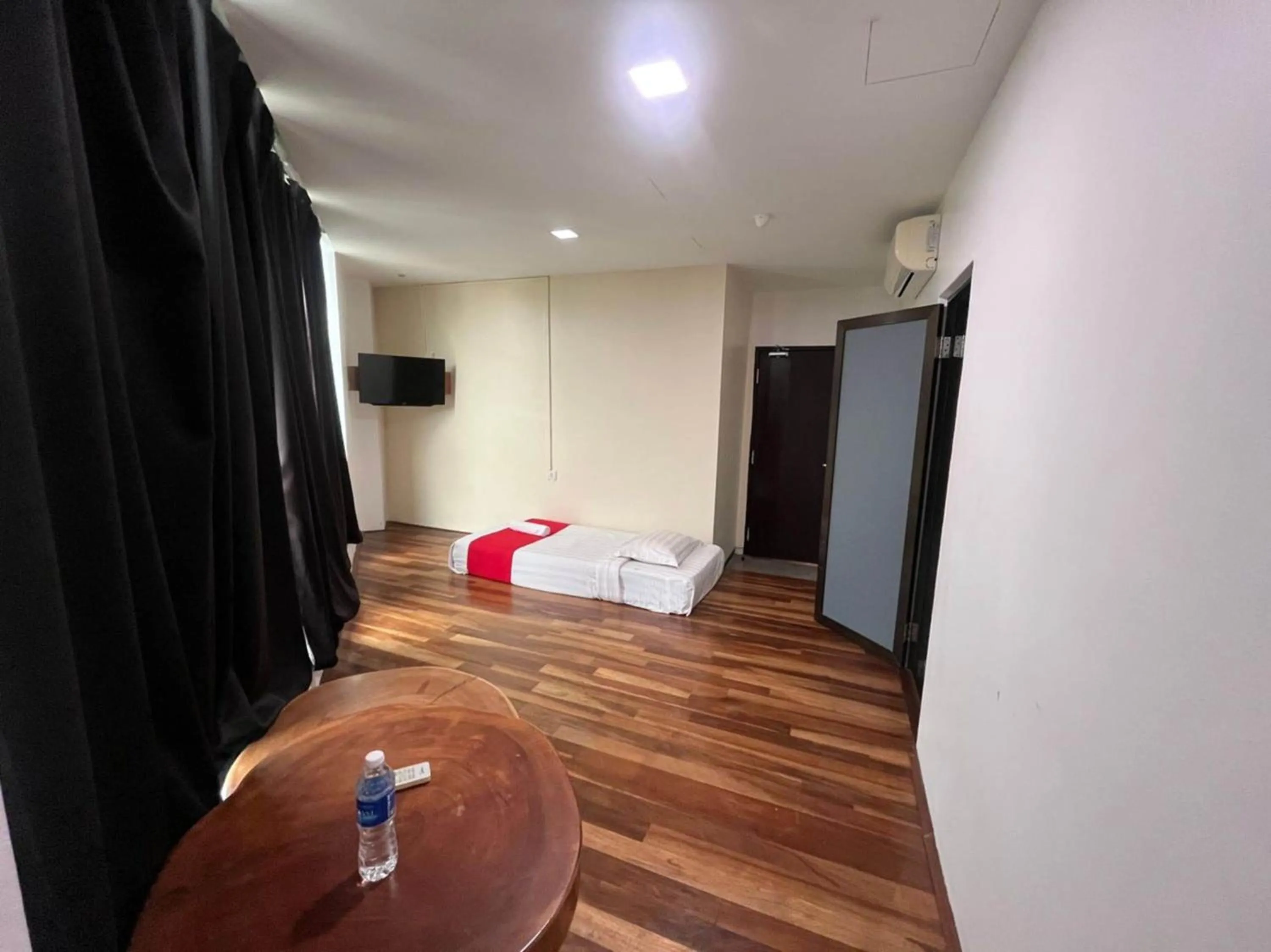 Bedroom in Capital O 89333 Musse Hotel