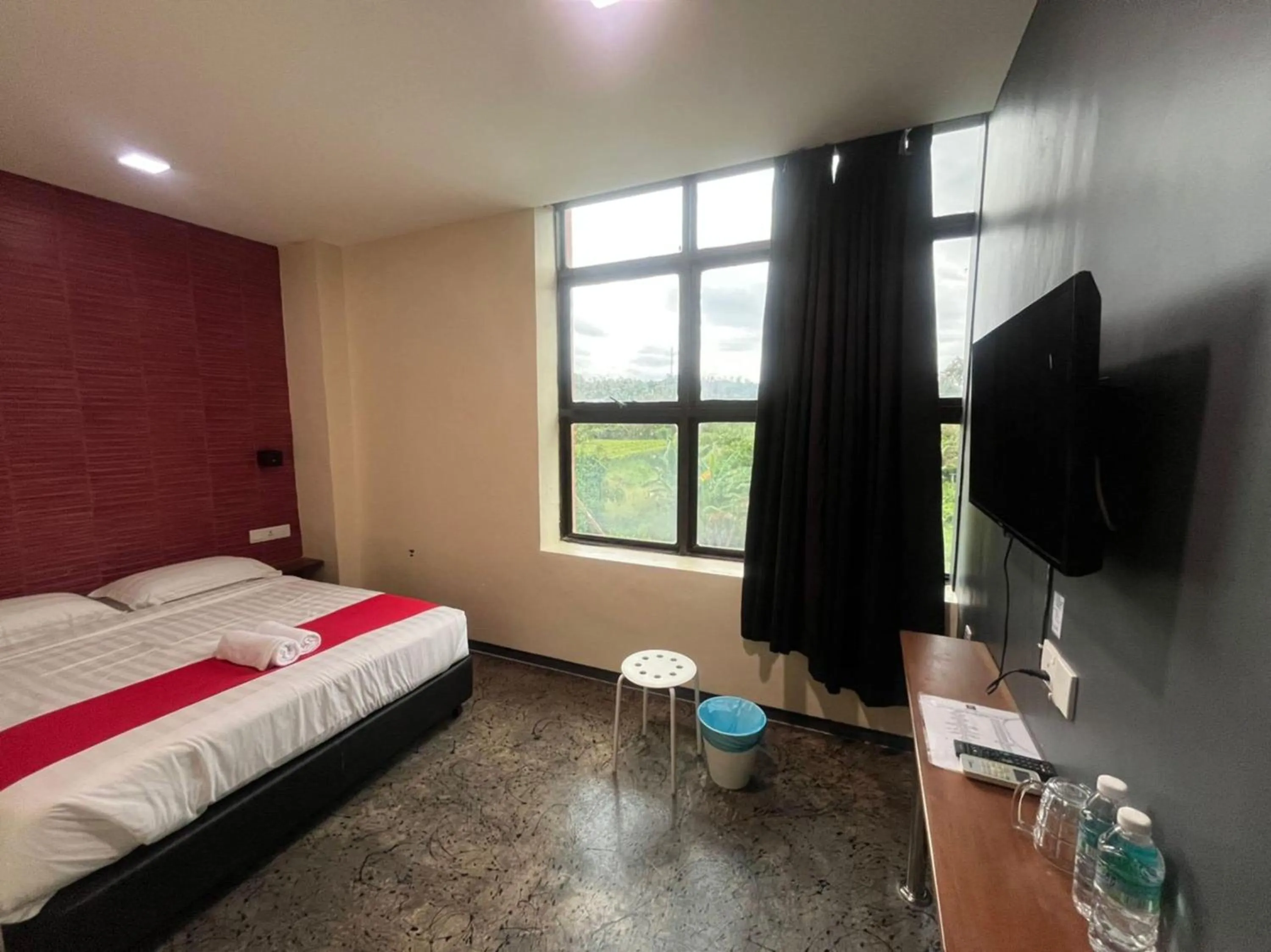 Bedroom in Capital O 89333 Musse Hotel