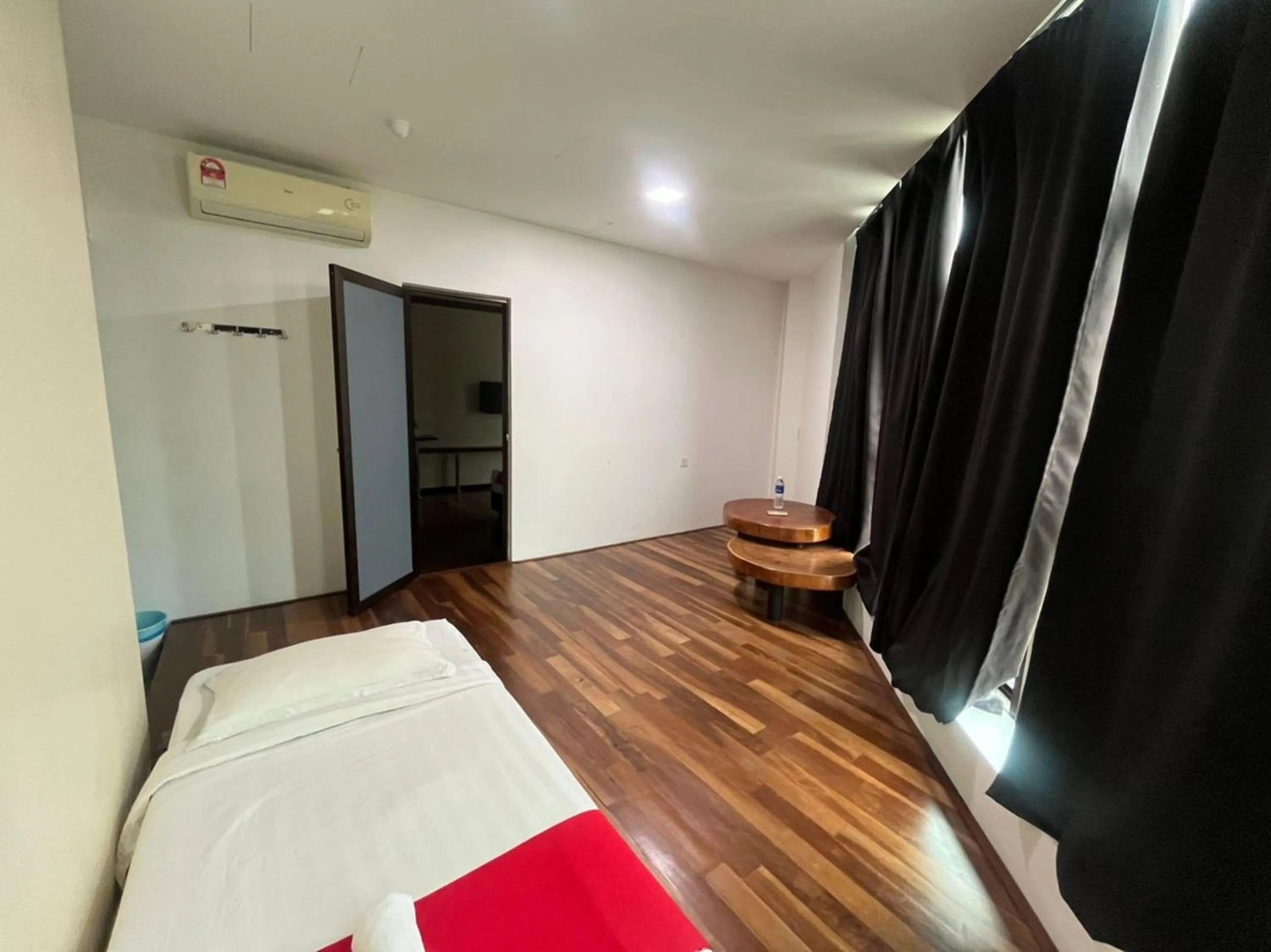 Bedroom in Capital O 89333 Musse Hotel